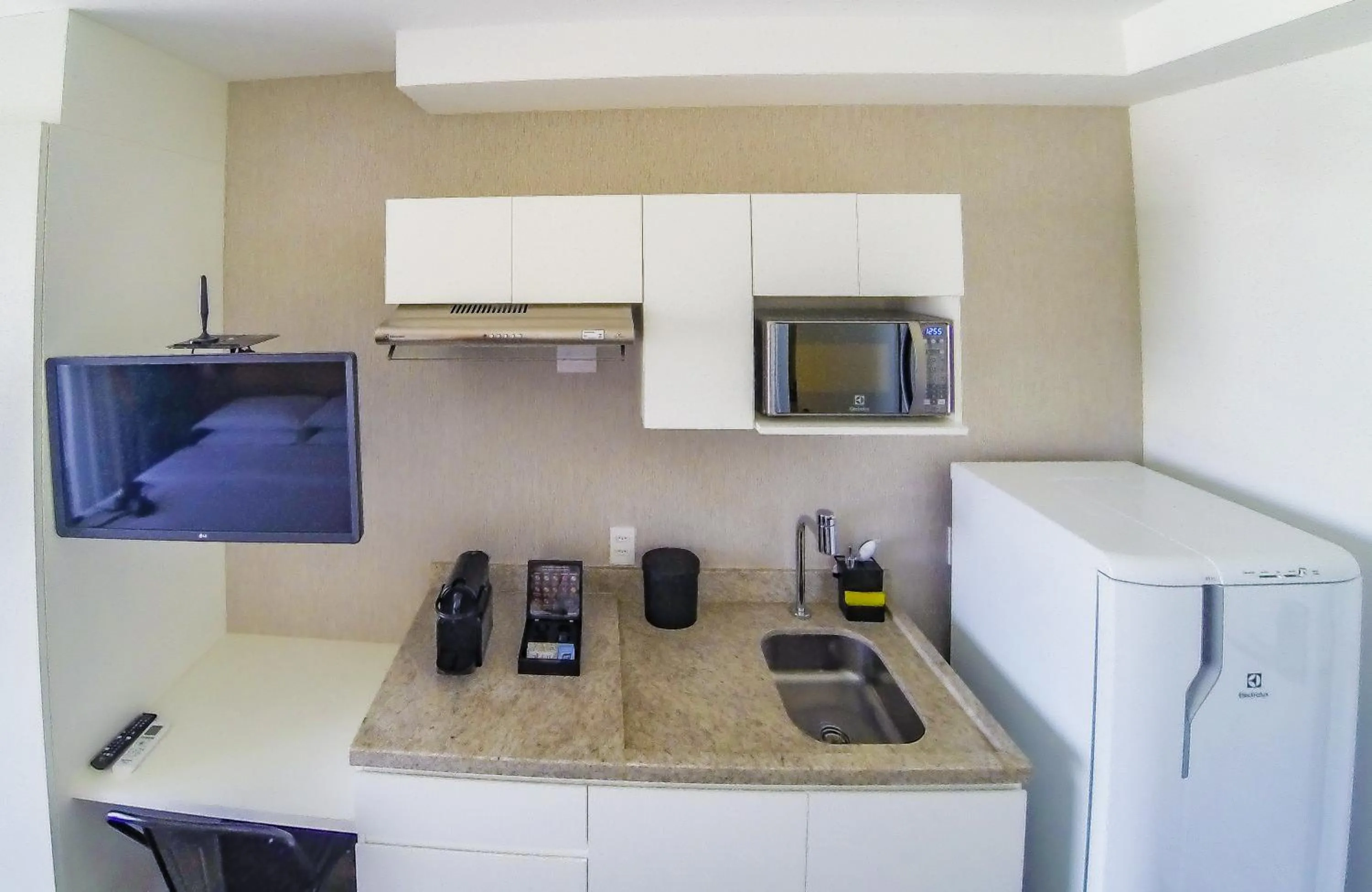 Kitchen or kitchenette in 360 Suítes Sé