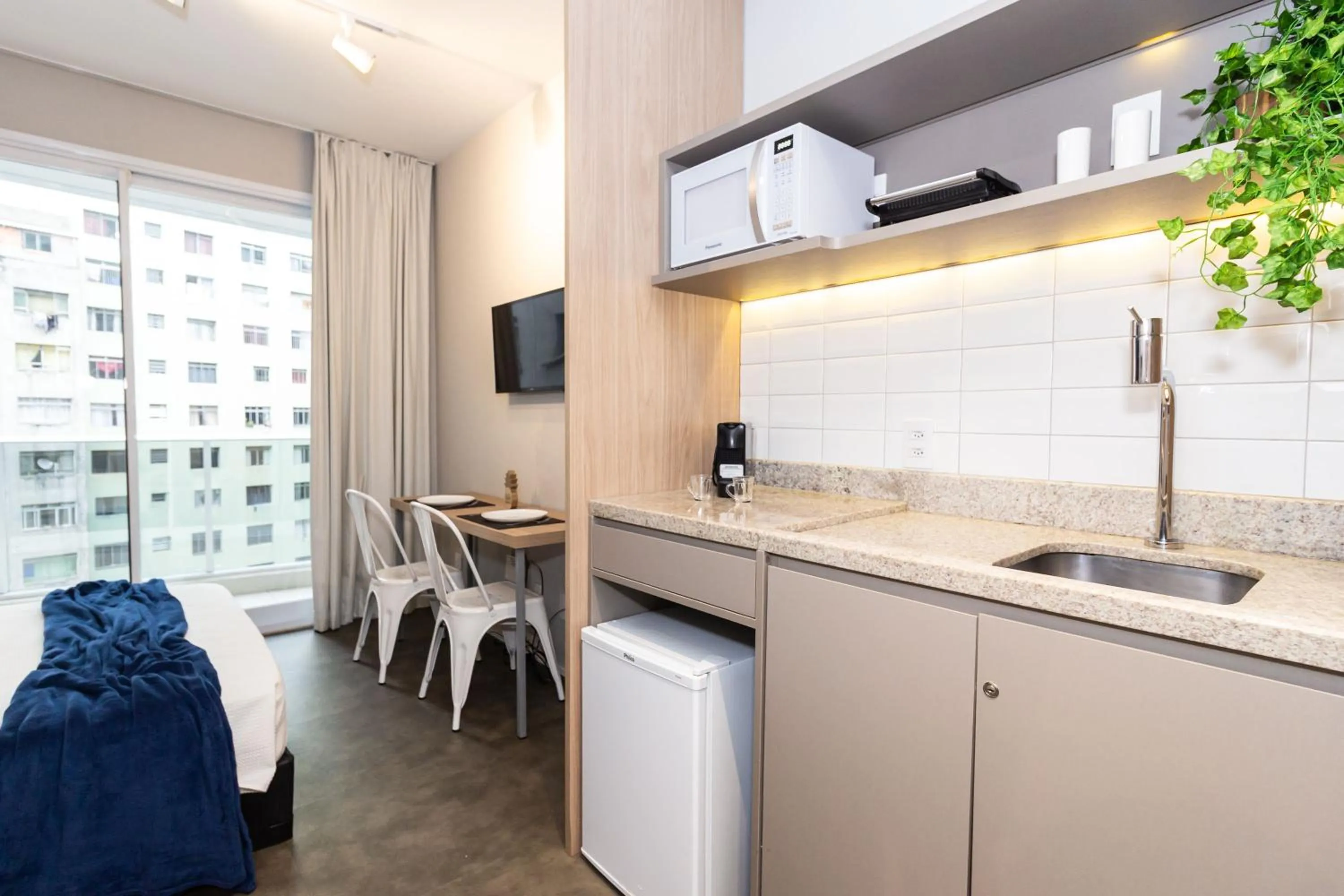 Kitchen or kitchenette in 360 Suítes Sé