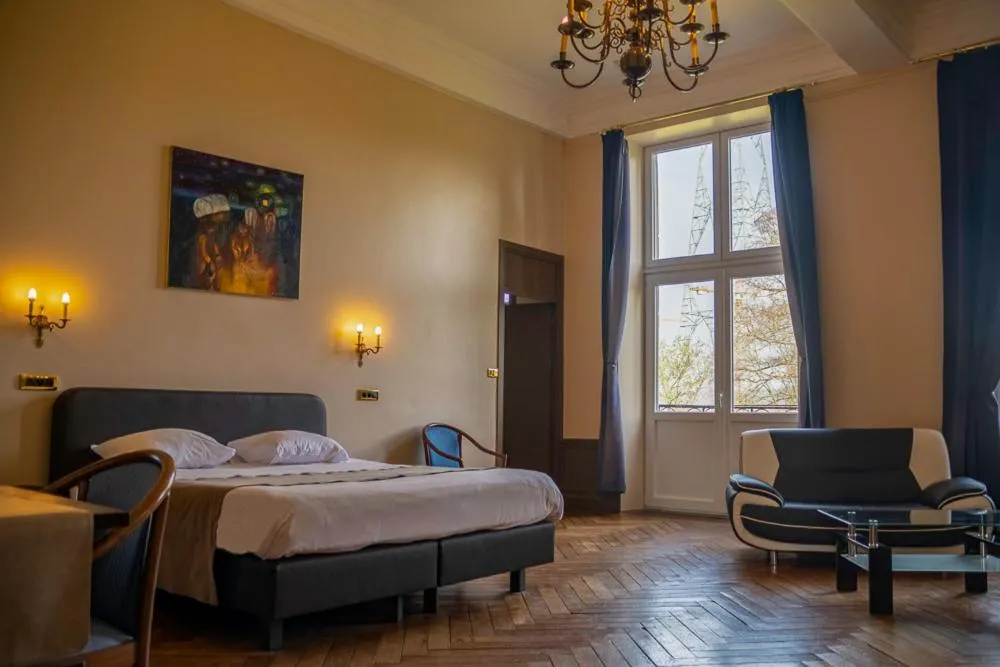 Photo of the whole room, Bed in Domaine Du Chateau De La Neuville