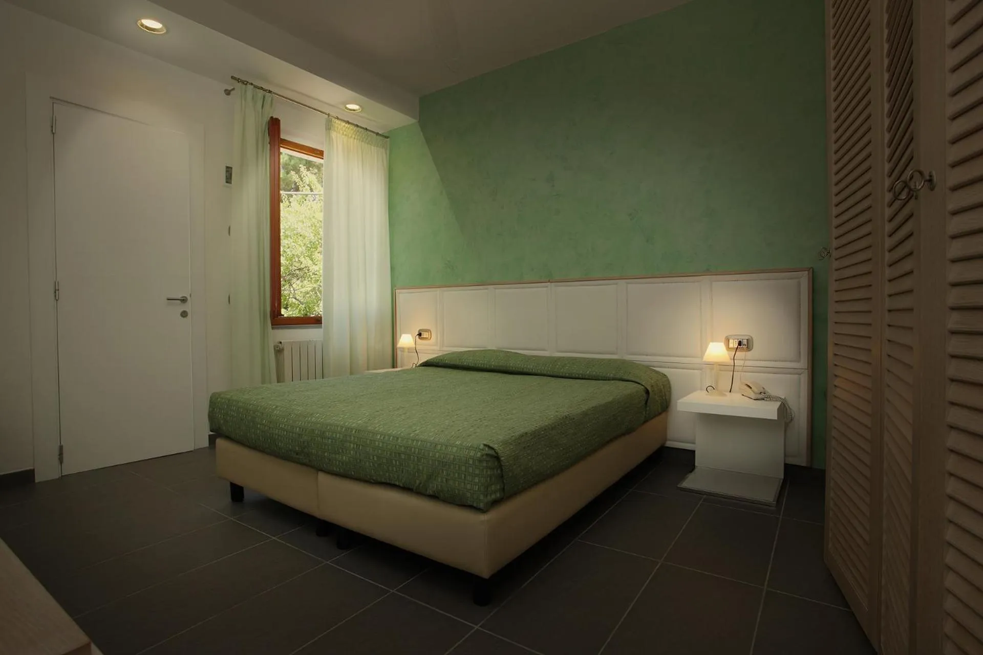 Bed in Boutique Hotel Ilio