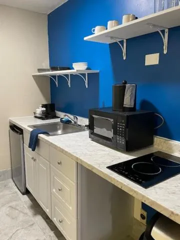 Kitchen or kitchenette in Days Inn by Wyndham Virginia Beach At The Beach