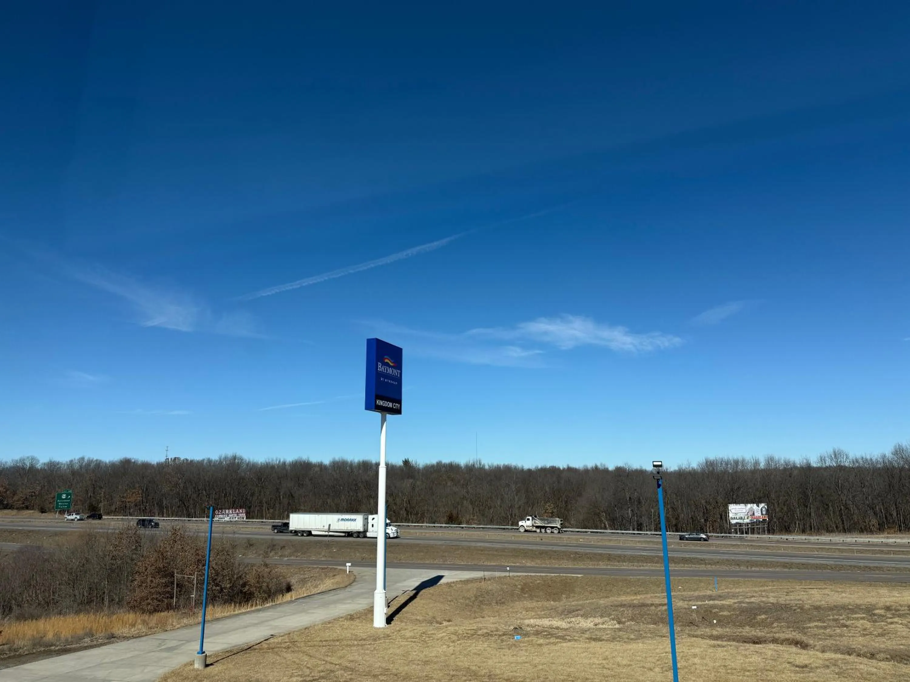 Property logo or sign in Baymont by Wyndham Kingdom City