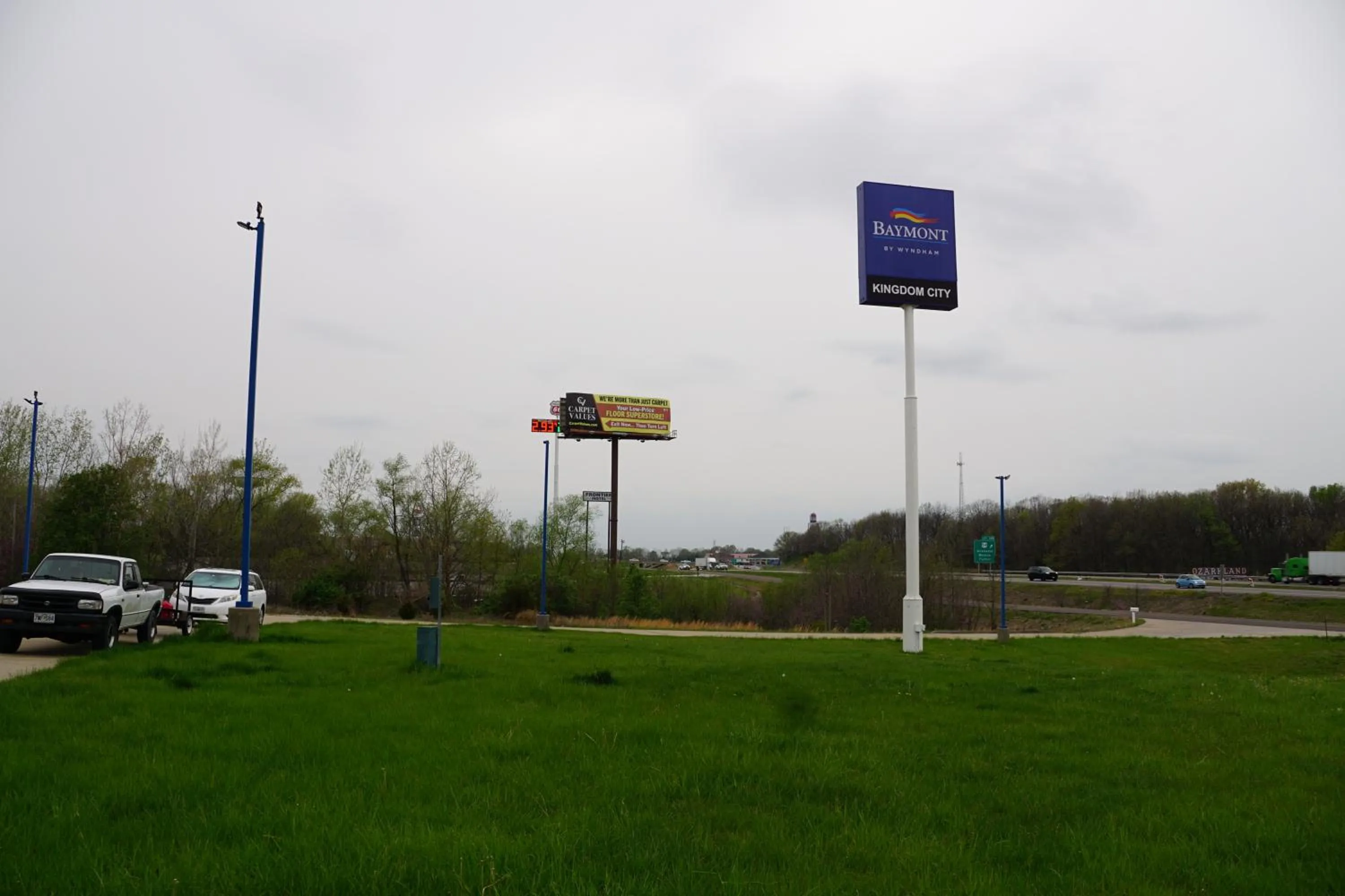 Property logo or sign in Baymont by Wyndham Kingdom City