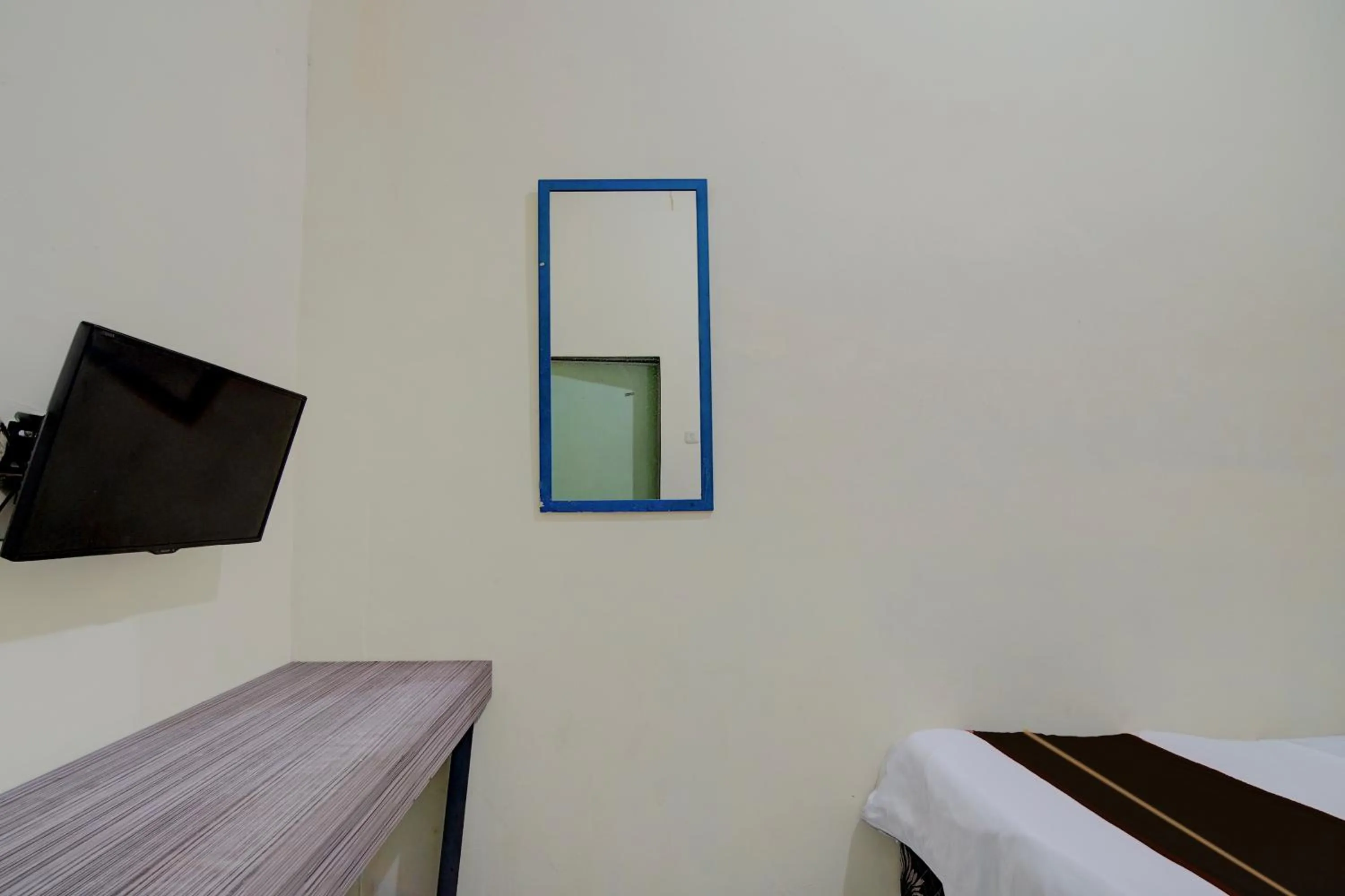 Bedroom, Bed in Hotel O Pekanbaru near Mall Ciputra Seraya formerly Lotus Inn