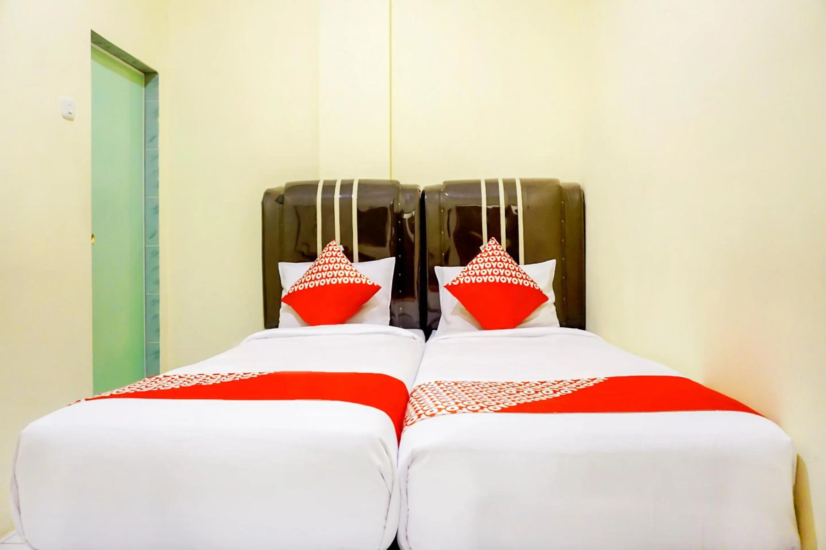 Bedroom, Bed in Hotel O Pekanbaru near Mall Ciputra Seraya formerly Lotus Inn