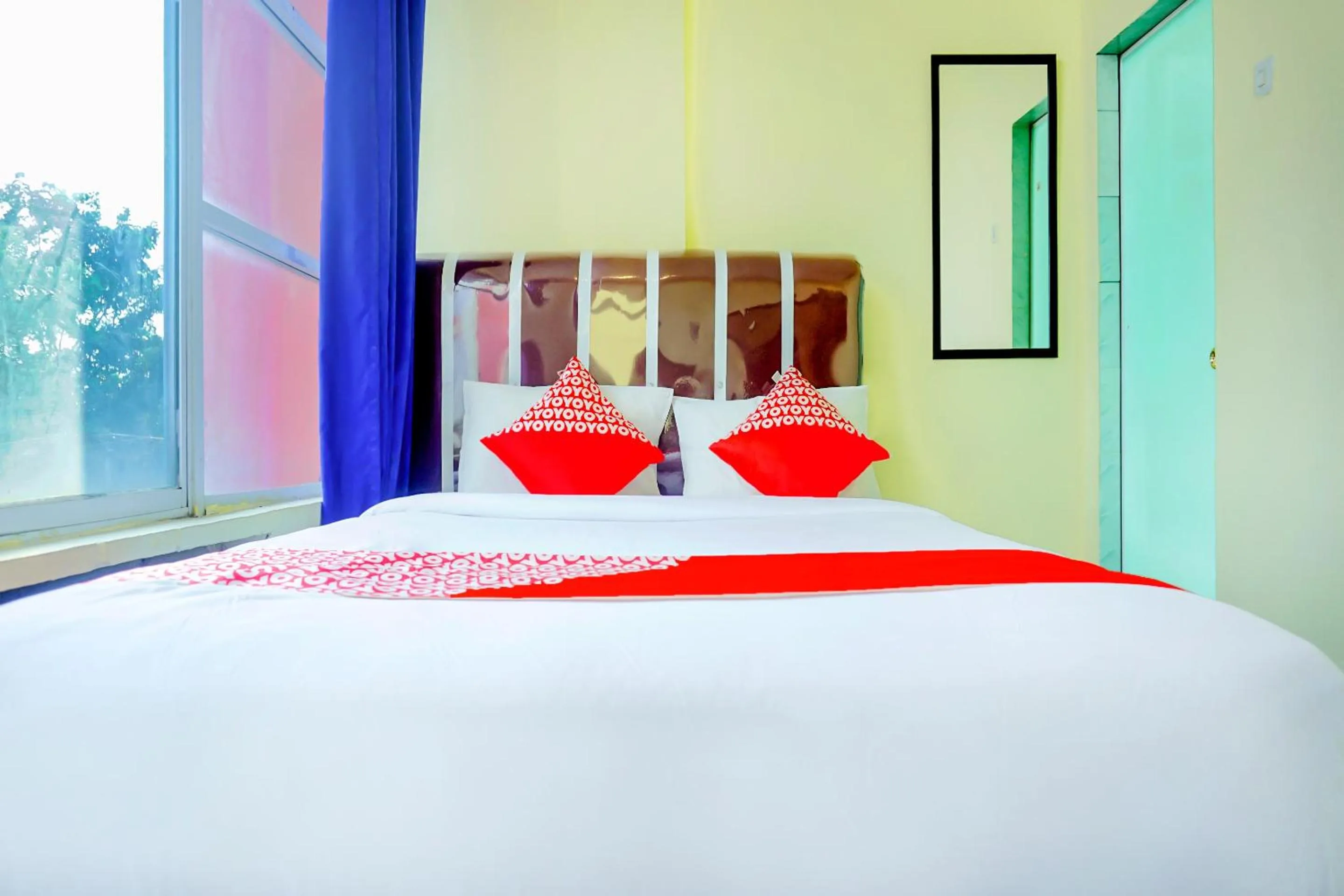 Bedroom, Bed in Hotel O Pekanbaru near Mall Ciputra Seraya formerly Lotus Inn