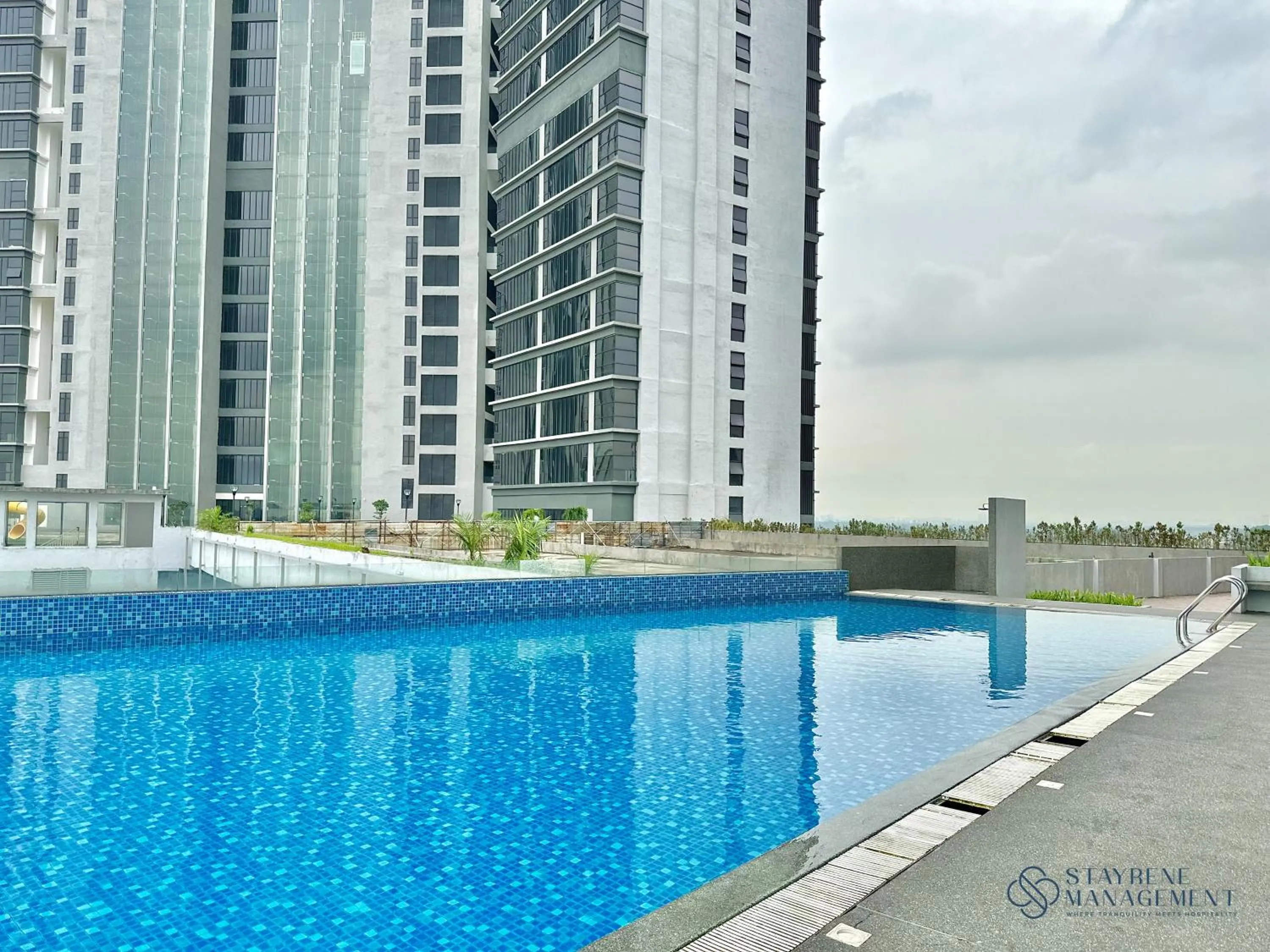 Swimming pool in D'Pristine Medini by Stayrene