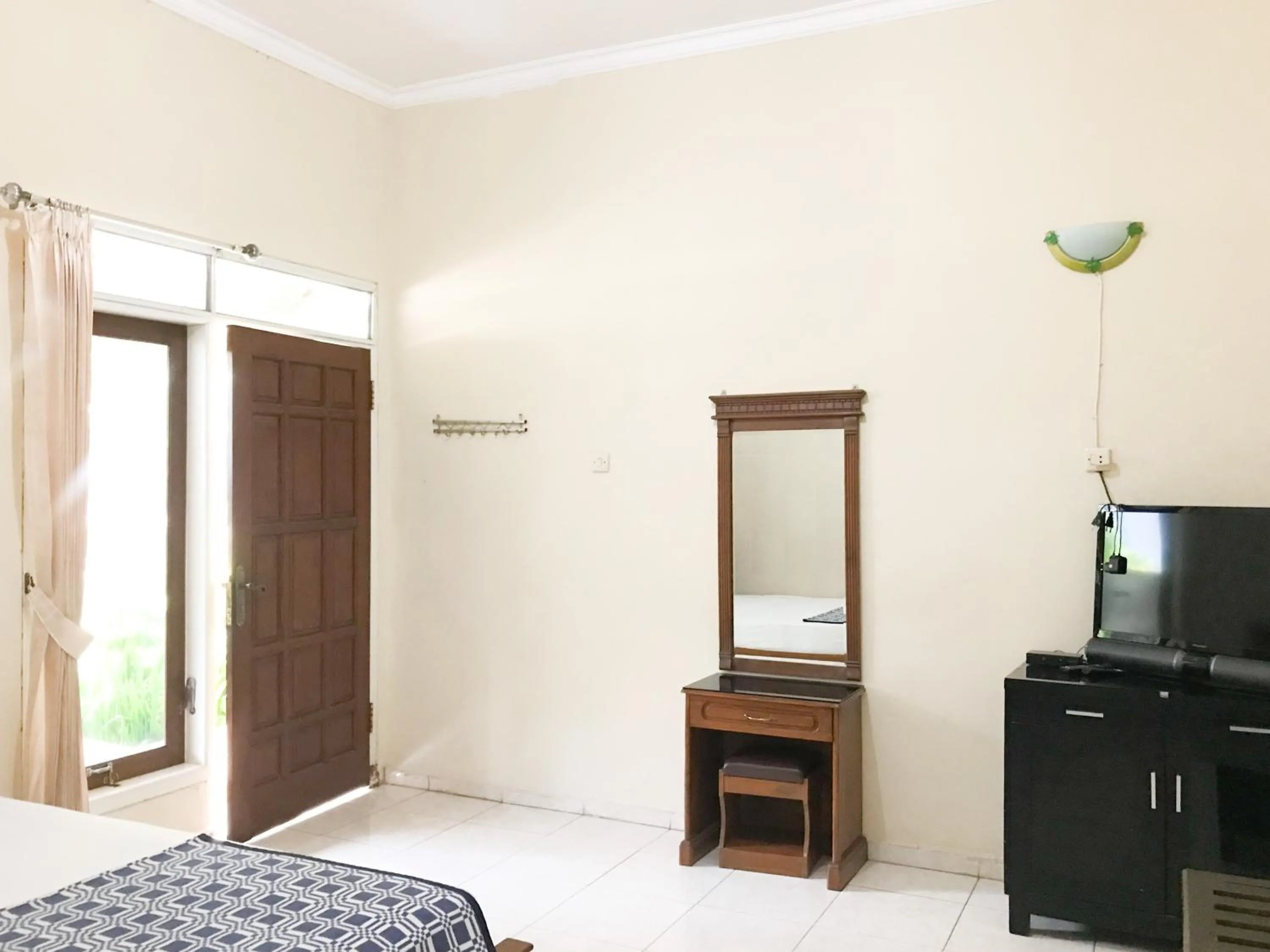 Bedroom, Bed in Villa Bunga Guest House RedPartner