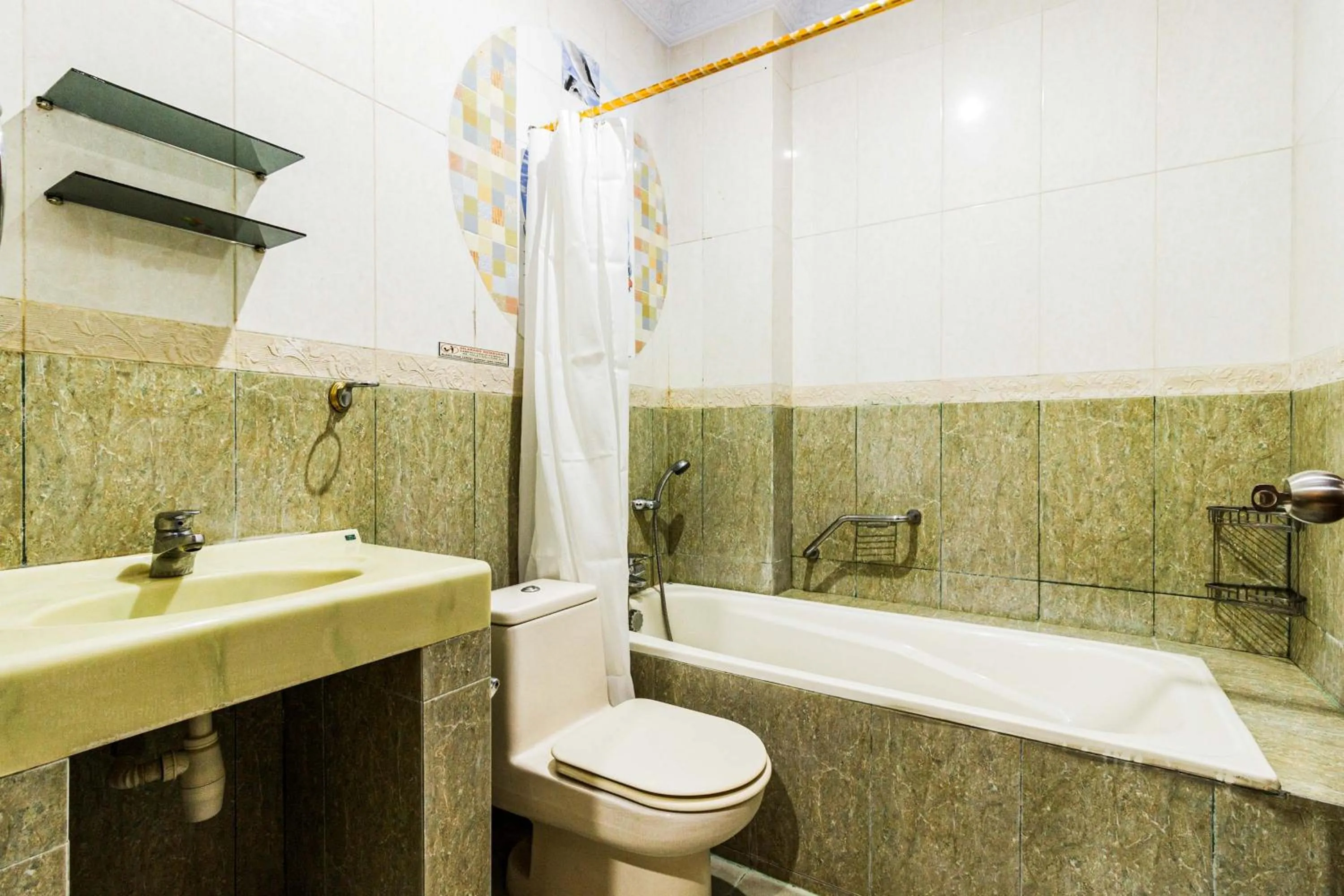 Bathroom in RedDoorz Plus near Pantai Malalayang Manado