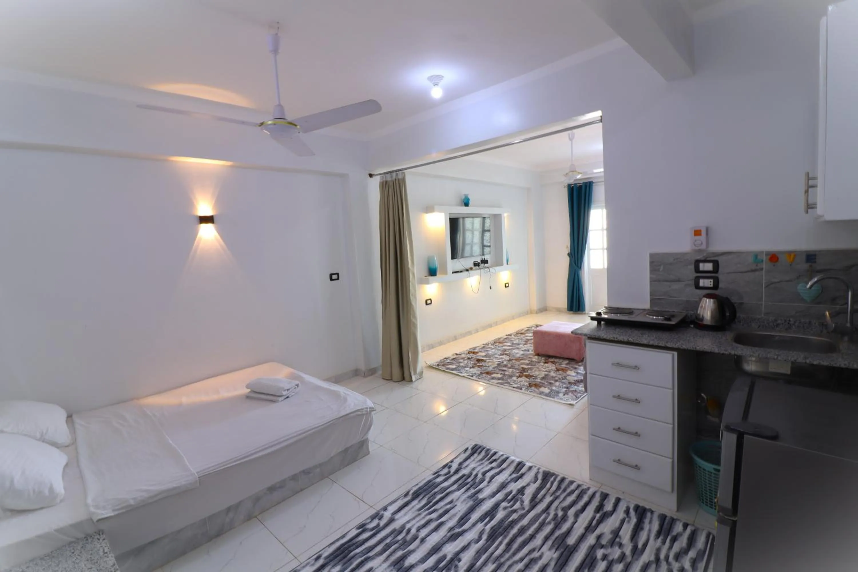 Bed in Mama Africa Apts & Studios