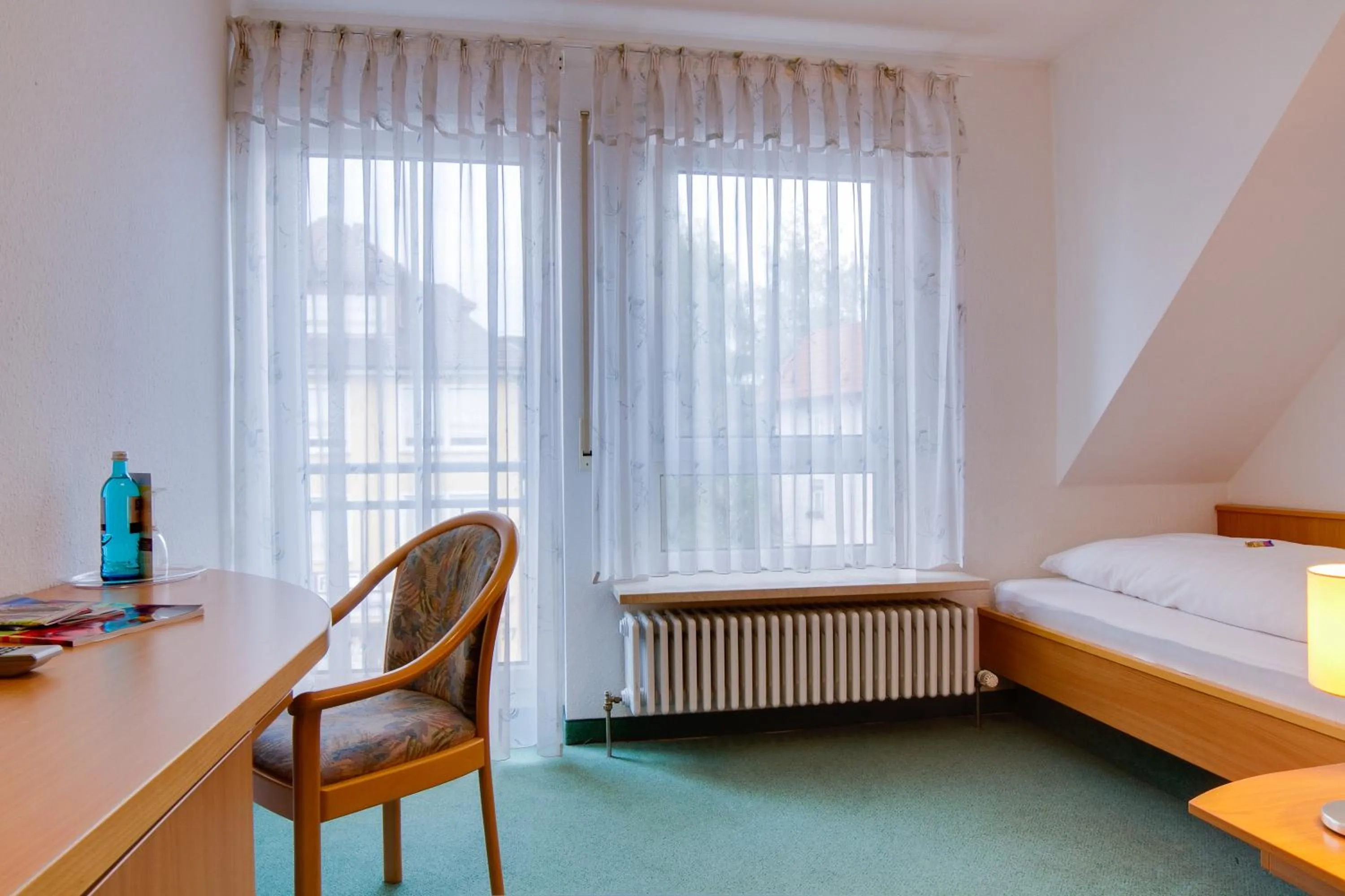 Photo of the whole room, Bed in Central Hotel Friedrichshafen