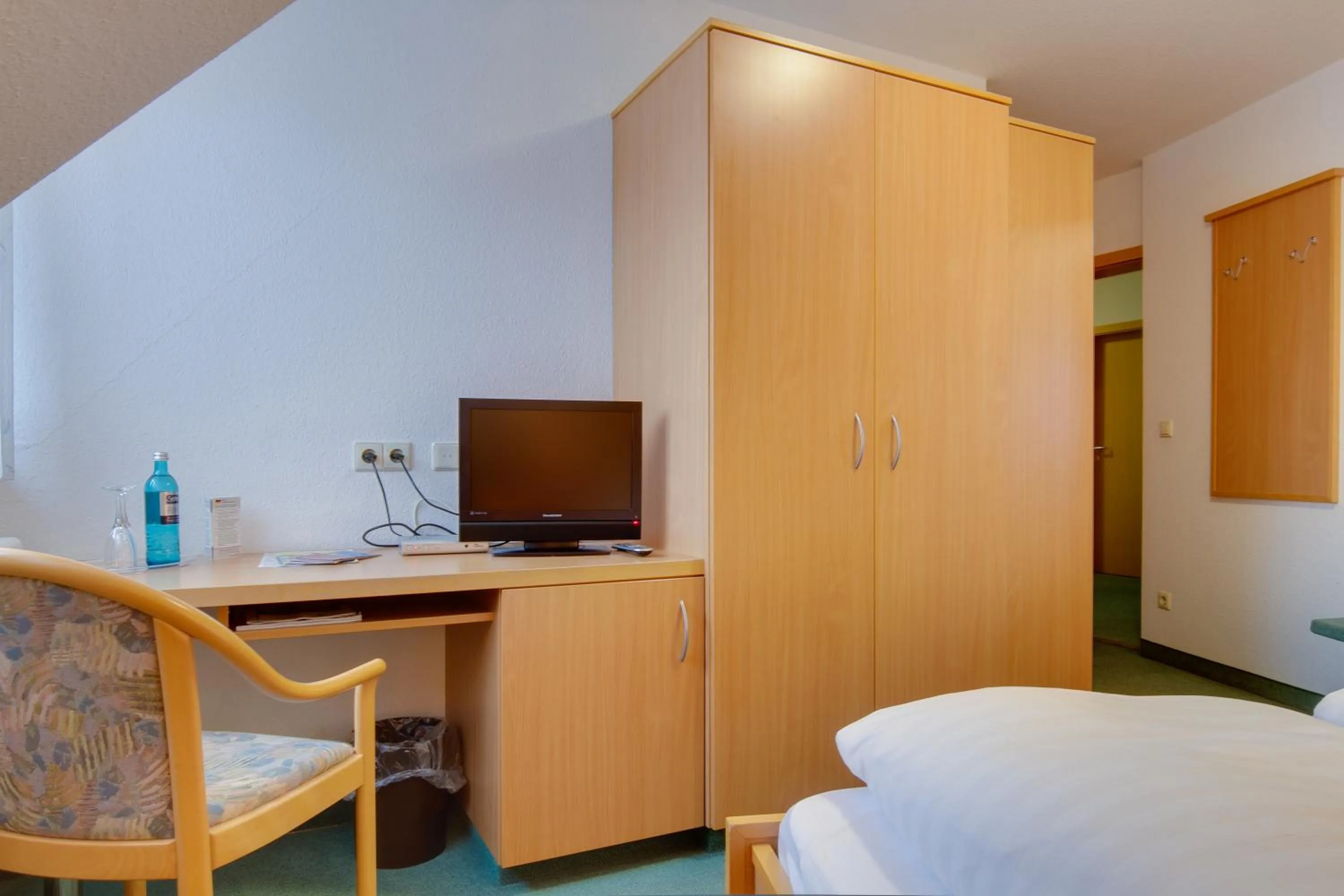 Photo of the whole room, Bed in Central Hotel Friedrichshafen