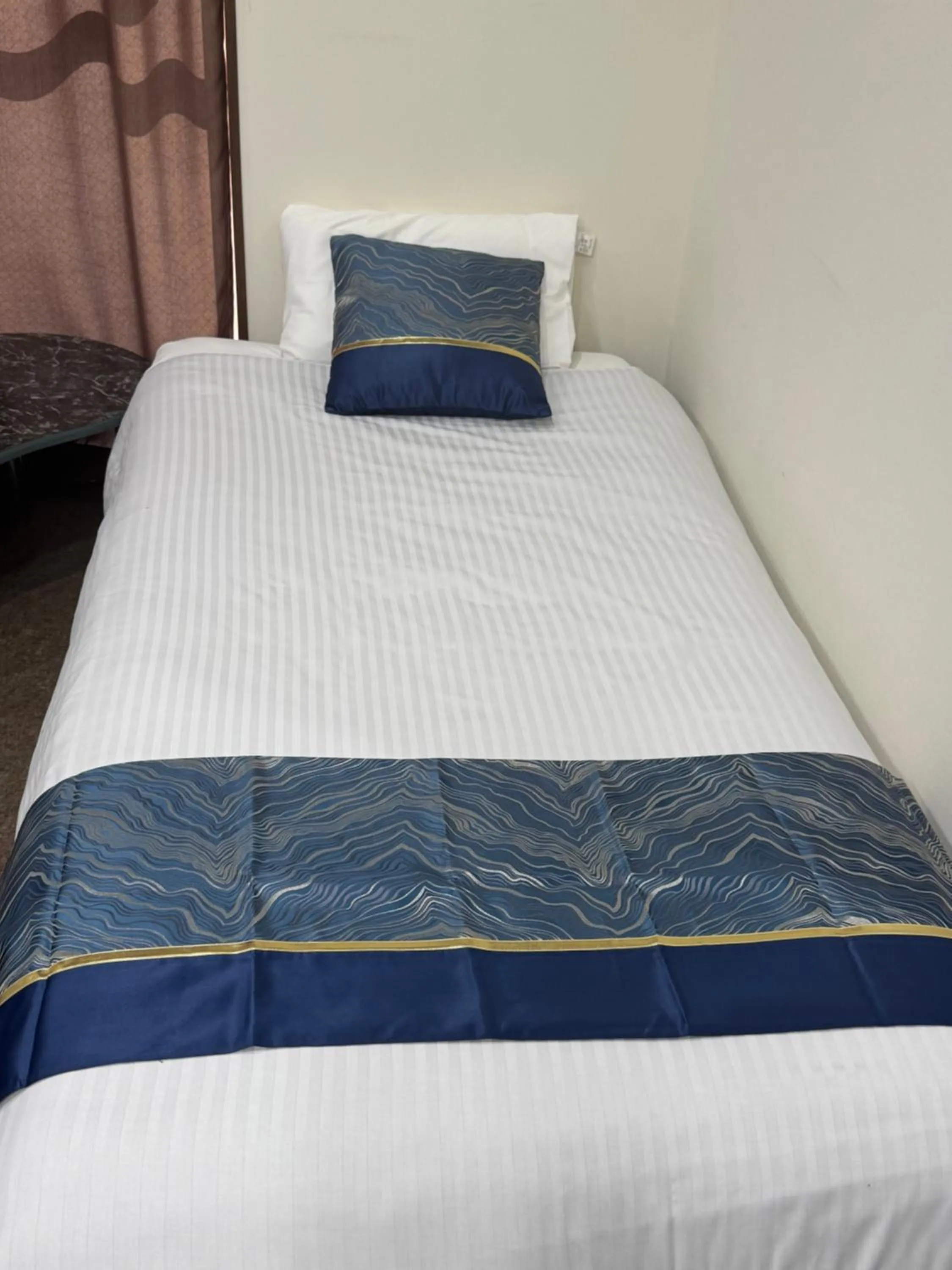 Bed in Thanyaporn Hotel