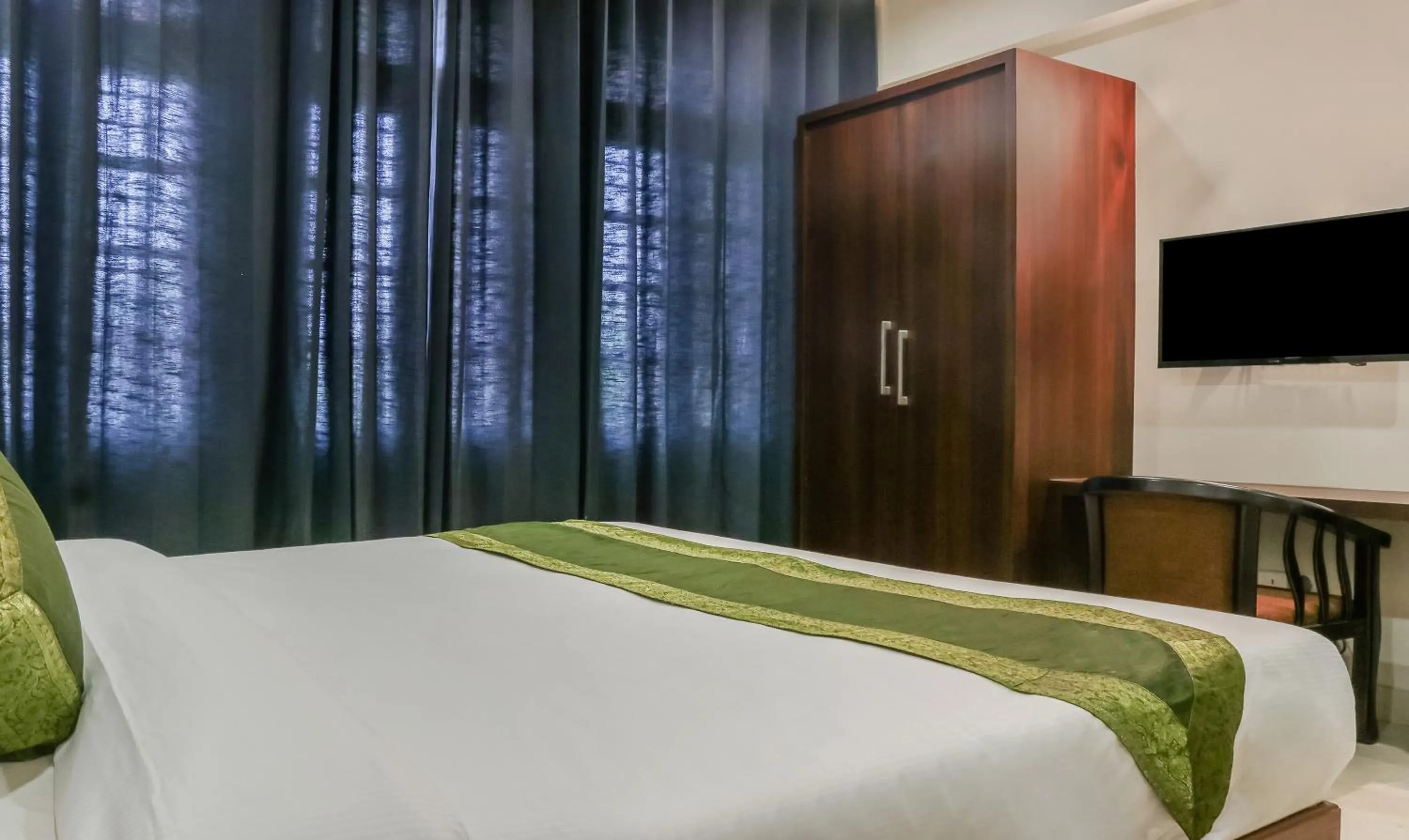 Bedroom, Bed in Treebo Casino