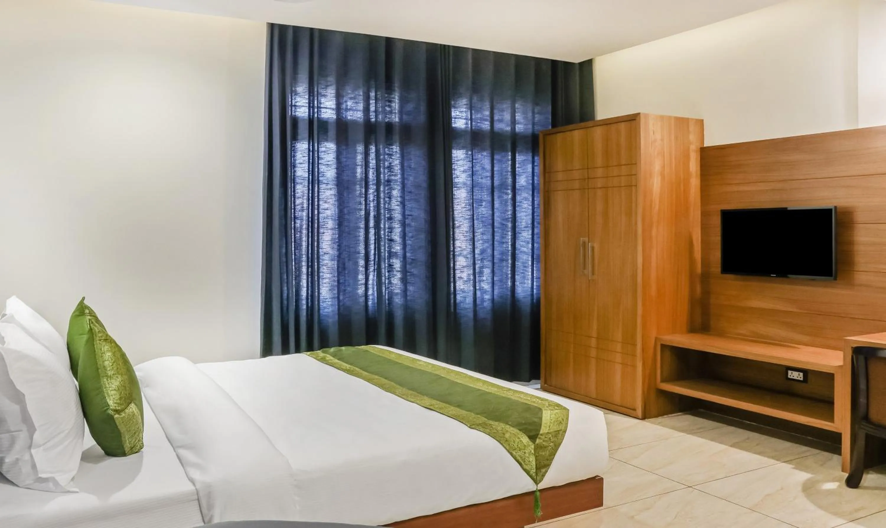 Bedroom, Bed in Treebo Casino