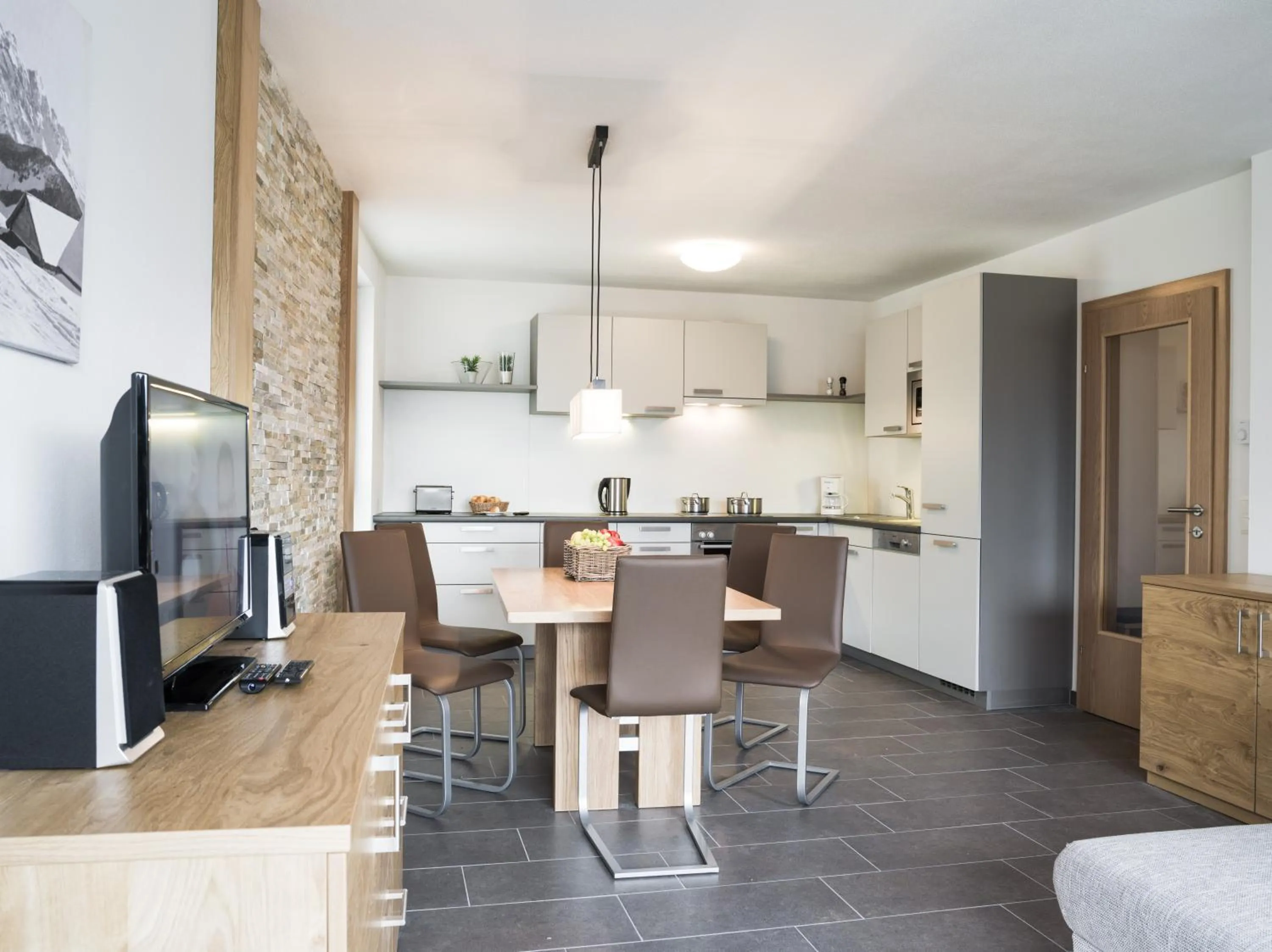 Kitchen or kitchenette in AlpenParks Residence Zell am See