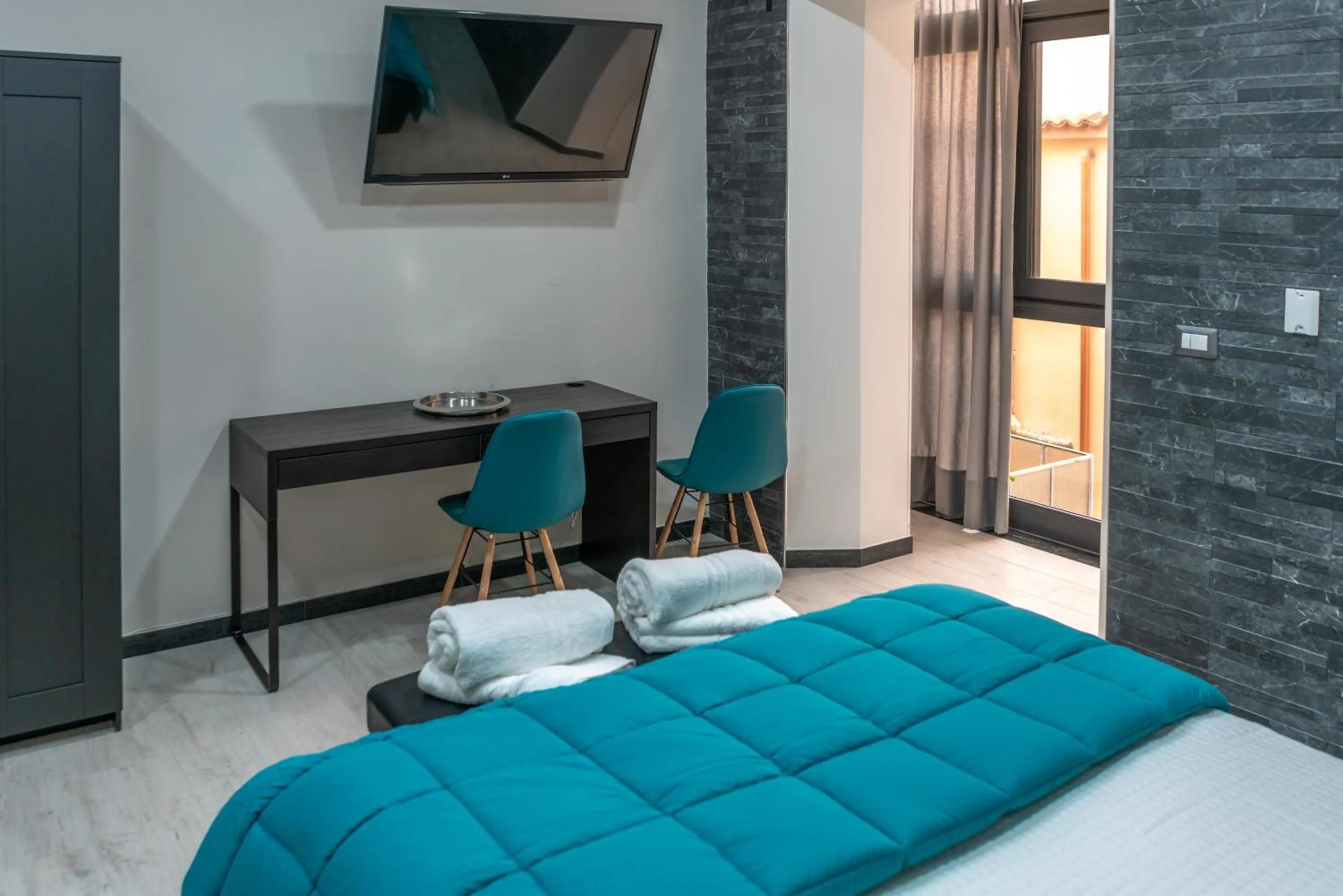 Bed in Marranzanu Rooms