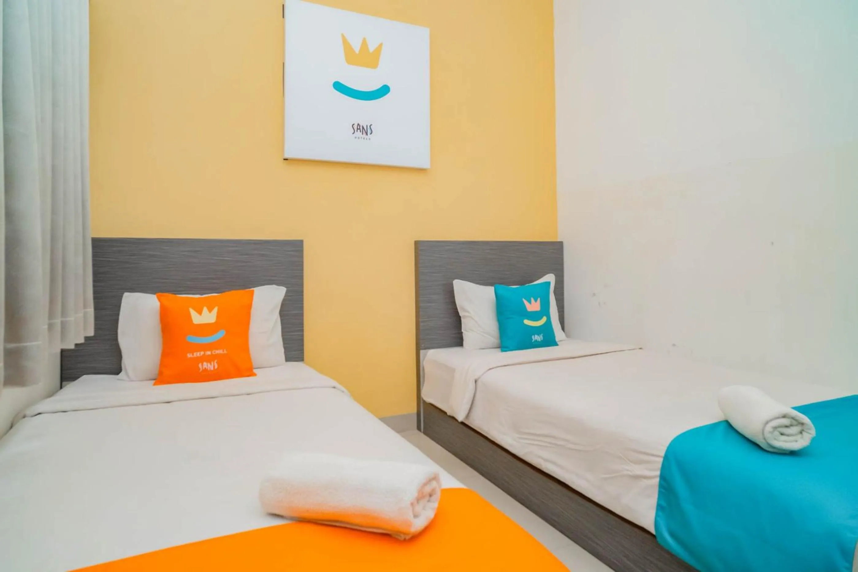 Bed in Sans Hotel Widarasari Cirebon