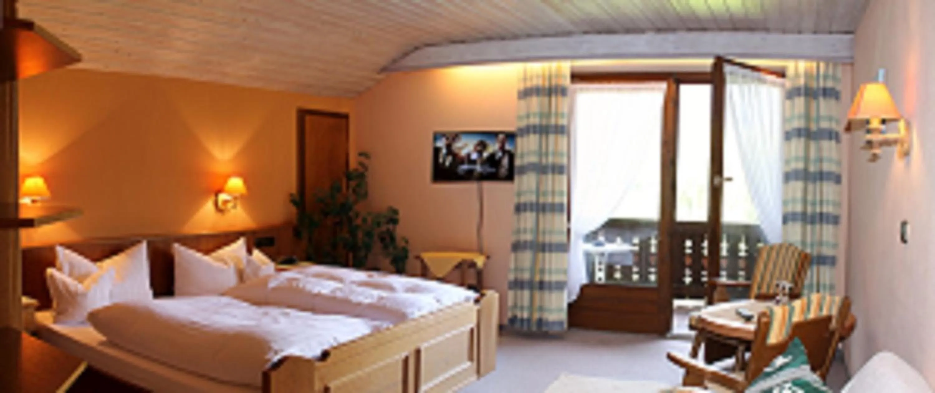 Photo of the whole room, Bed in DEVA Hotel-Restaurant Fischerwirt inklusive Chiemgau Card