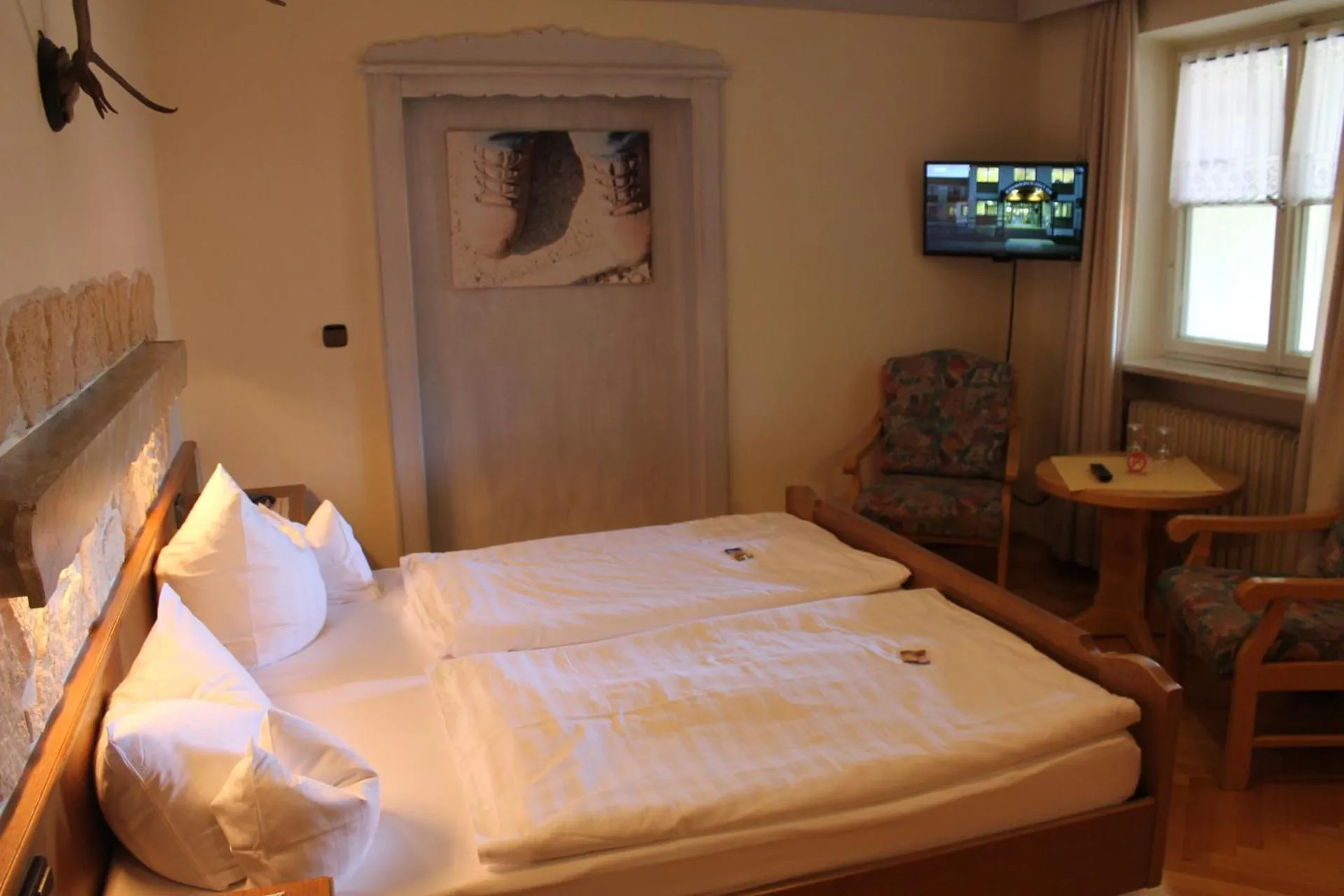 Photo of the whole room, Bed in DEVA Hotel-Restaurant Fischerwirt inklusive Chiemgau Card
