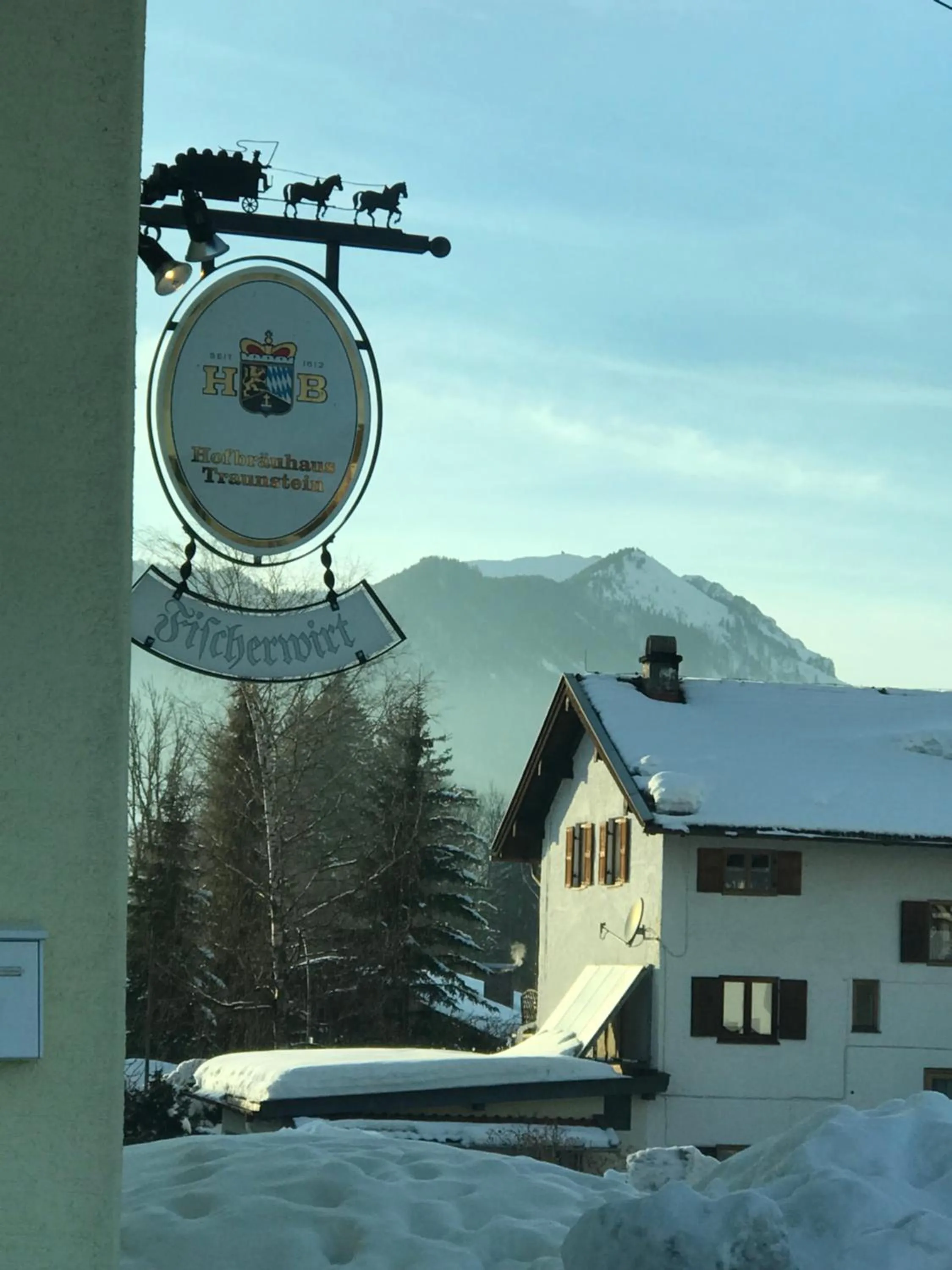 Property logo or sign in DEVA Hotel-Restaurant Fischerwirt inklusive Chiemgau Card