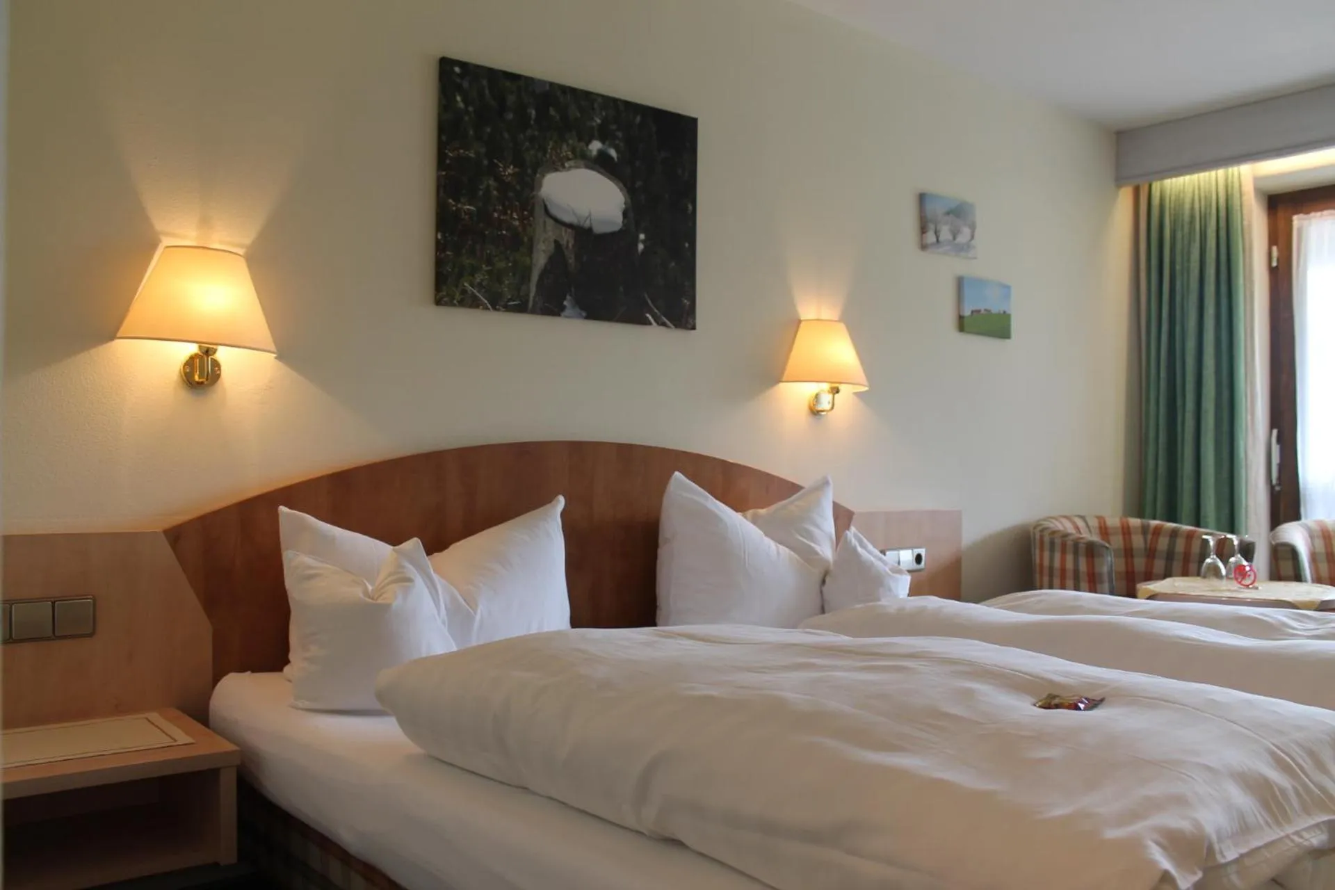 Photo of the whole room, Bed in DEVA Hotel-Restaurant Fischerwirt inklusive Chiemgau Card