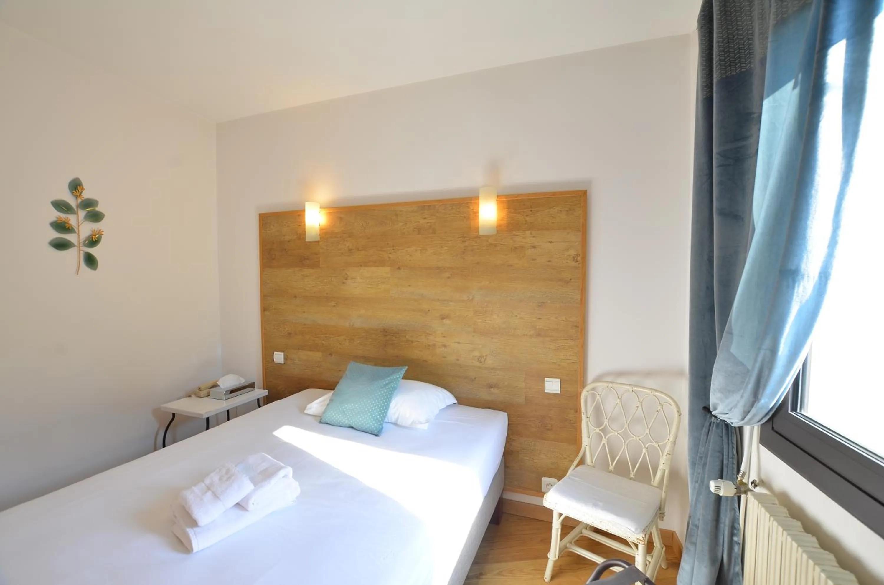 Bedroom, Bed in Logis Hôtels - Hôtel Restaurant du Midi