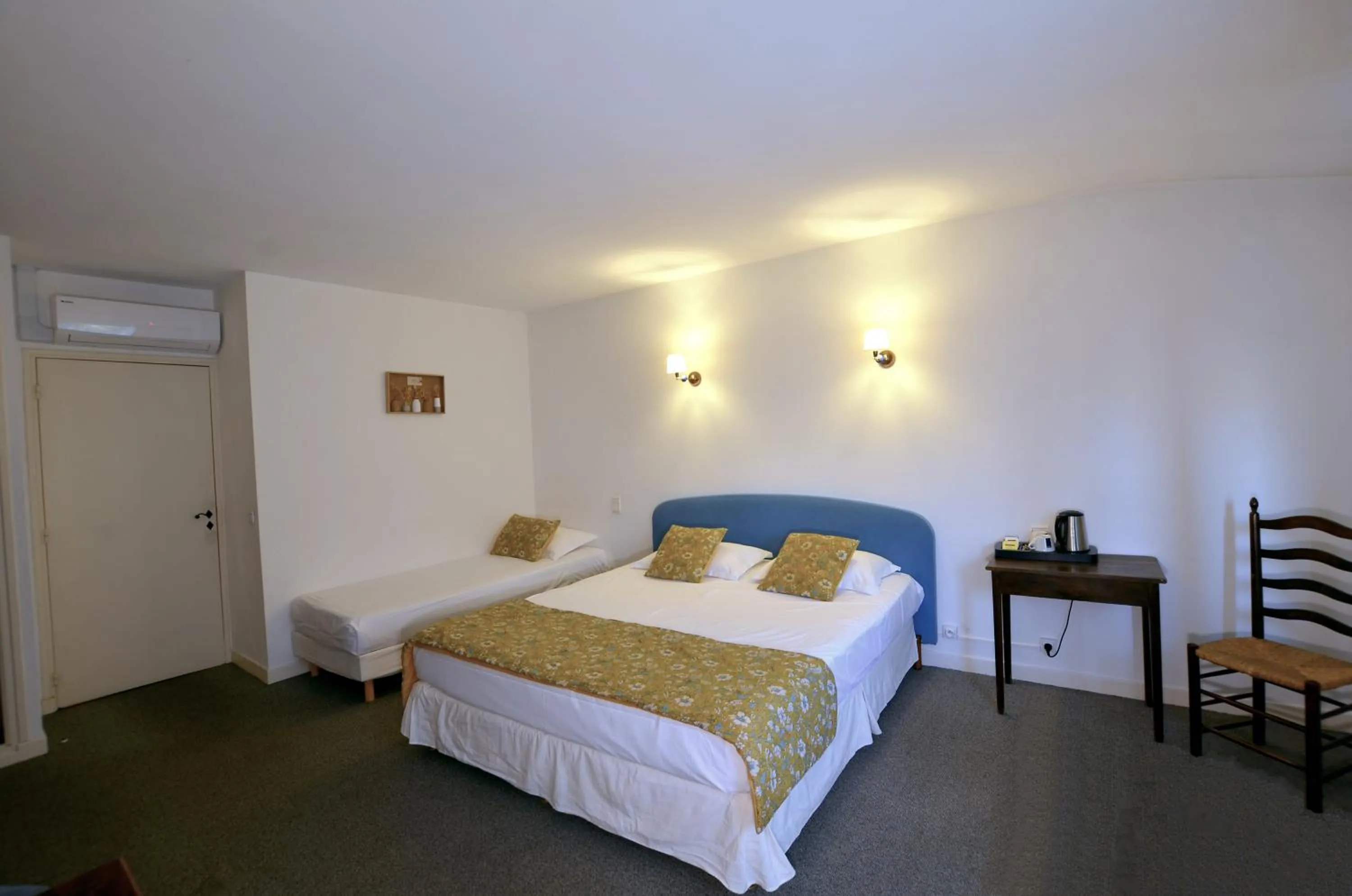 Bedroom, Bed in Logis Hôtels - Hôtel Restaurant du Midi