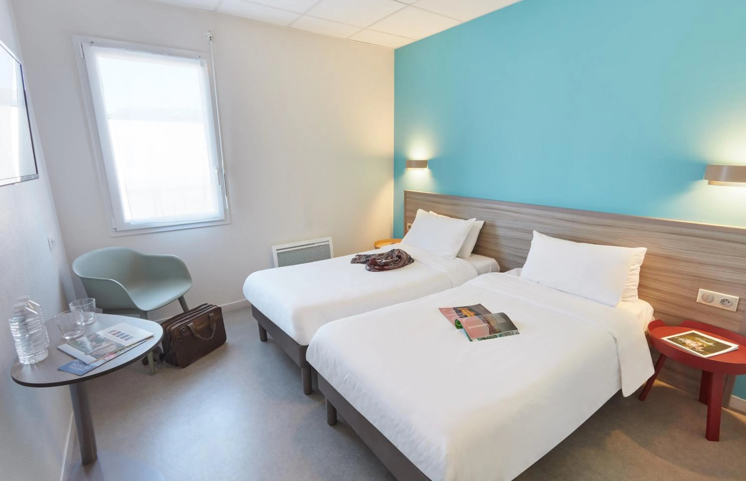 Bed in Ashley Hotel Le Mans Sud