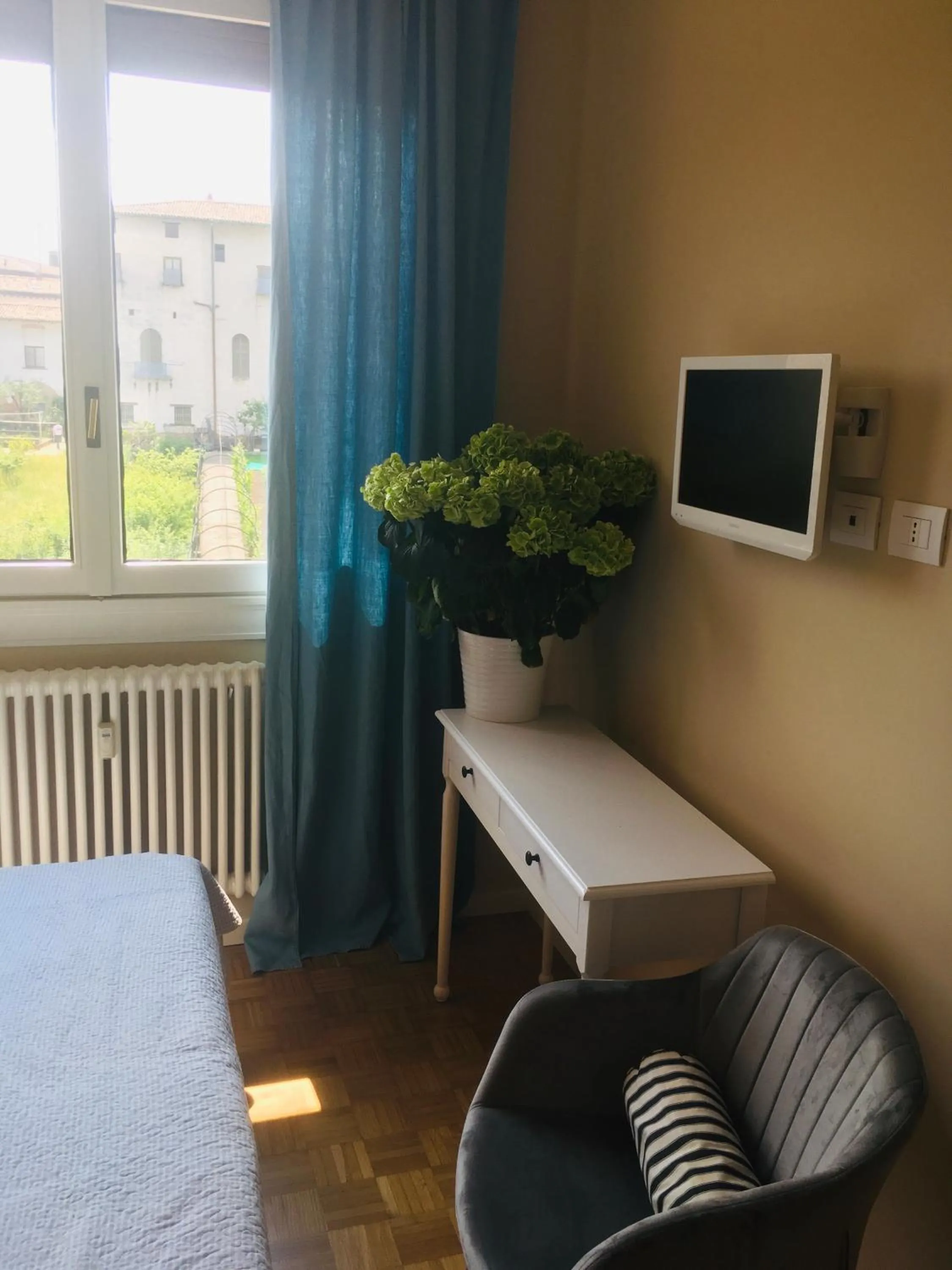 Communal lounge/ TV room in B&B San Benedetto