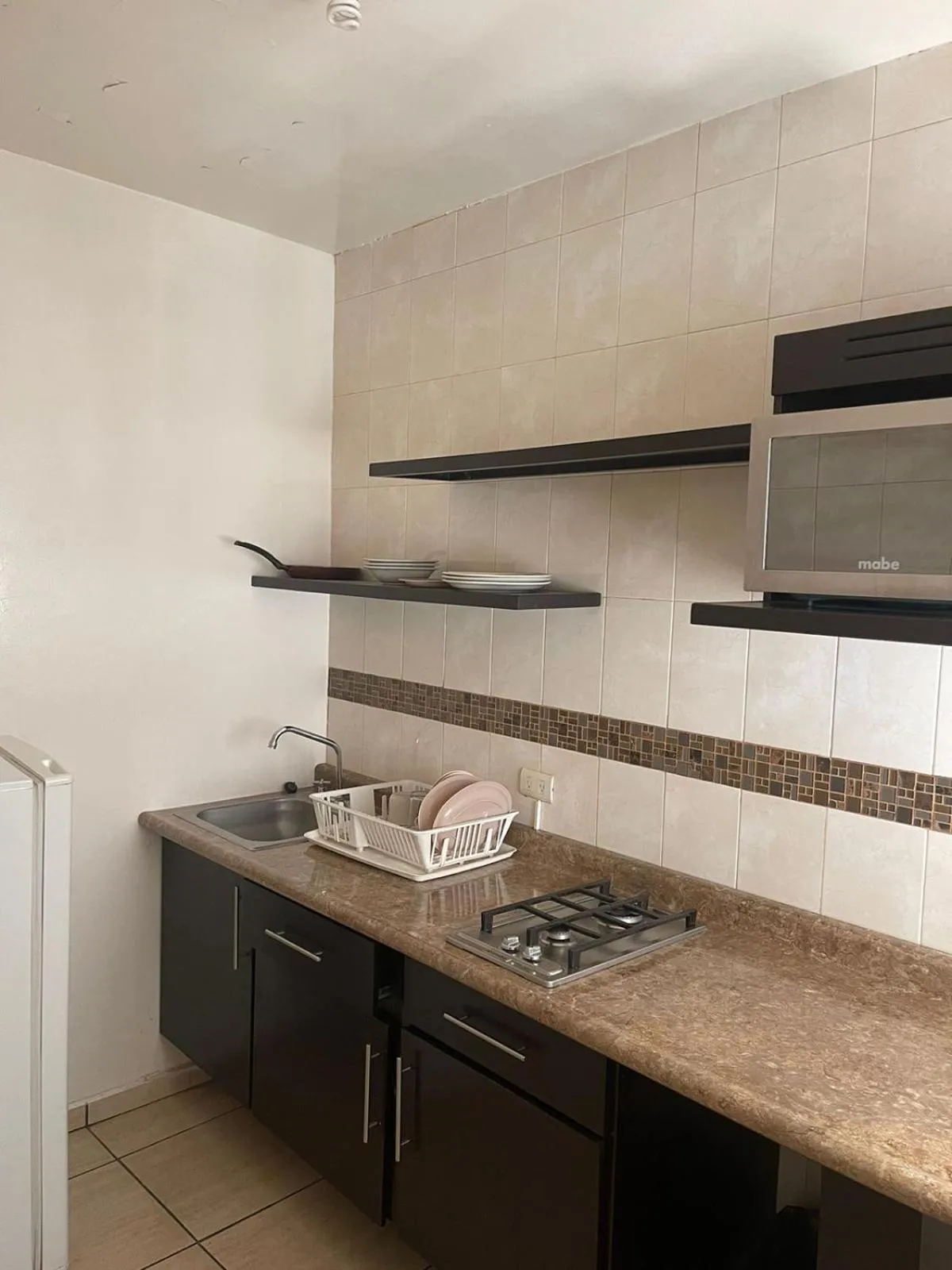 Kitchen or kitchenette in Hotel Rincon Real Suites