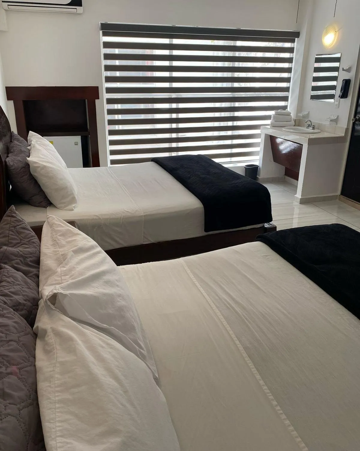 Bed in Hotel Rincon Real Suites