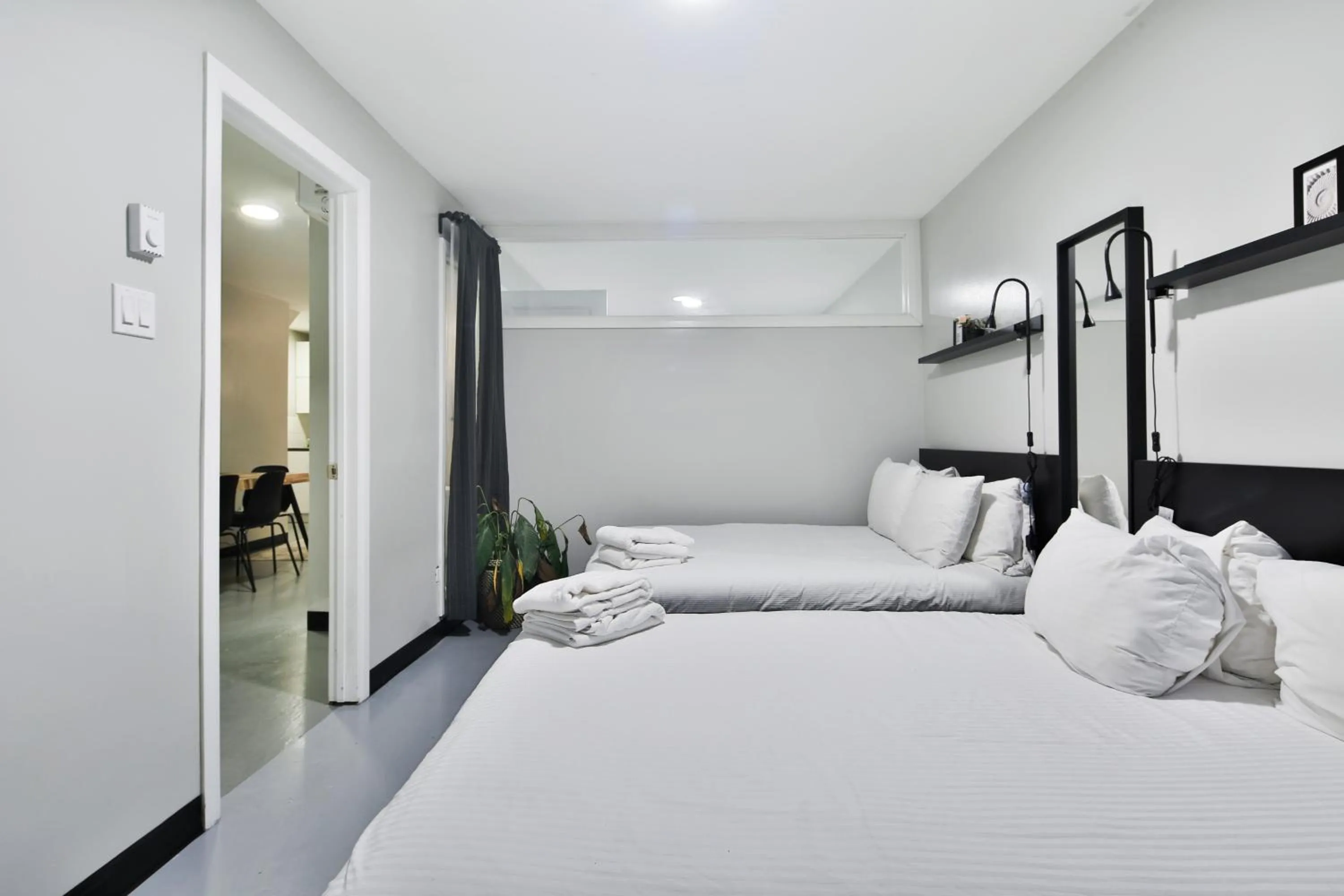 Bed in Parc Avenue Lofts