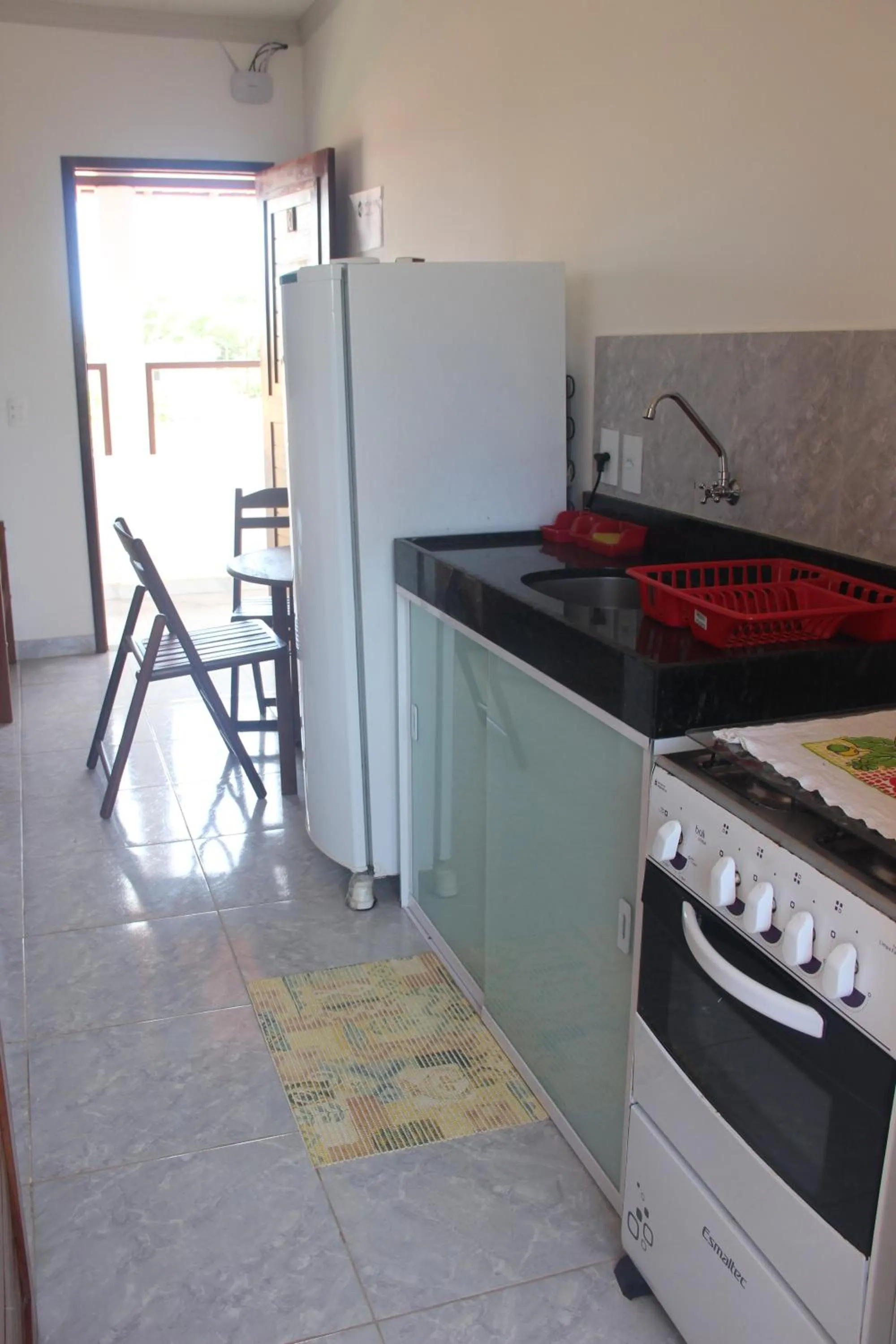 Kitchen or kitchenette in Flat's Portal do Sol-SMG