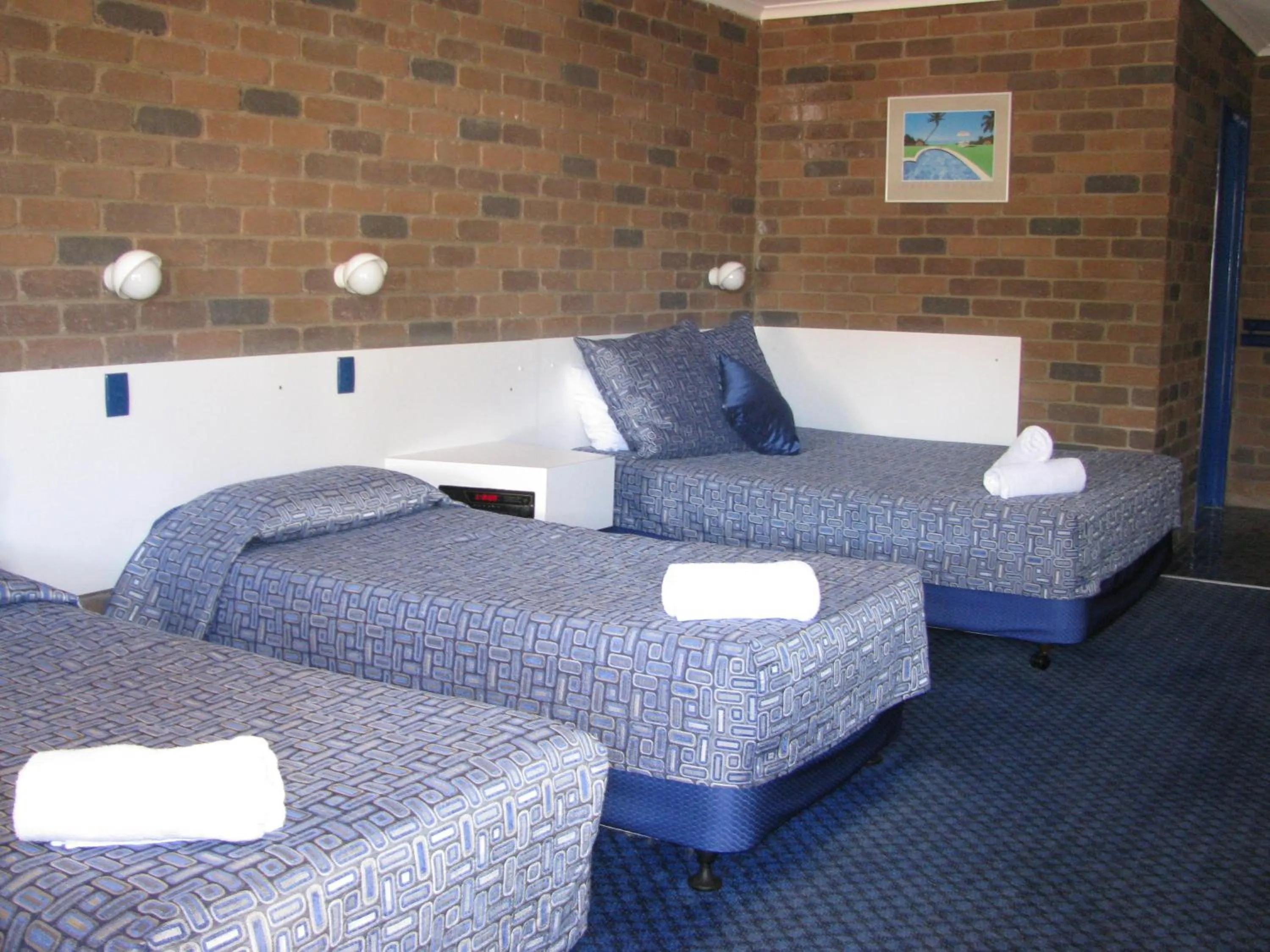 Bedroom in Cattleman's Rest Motor Inn