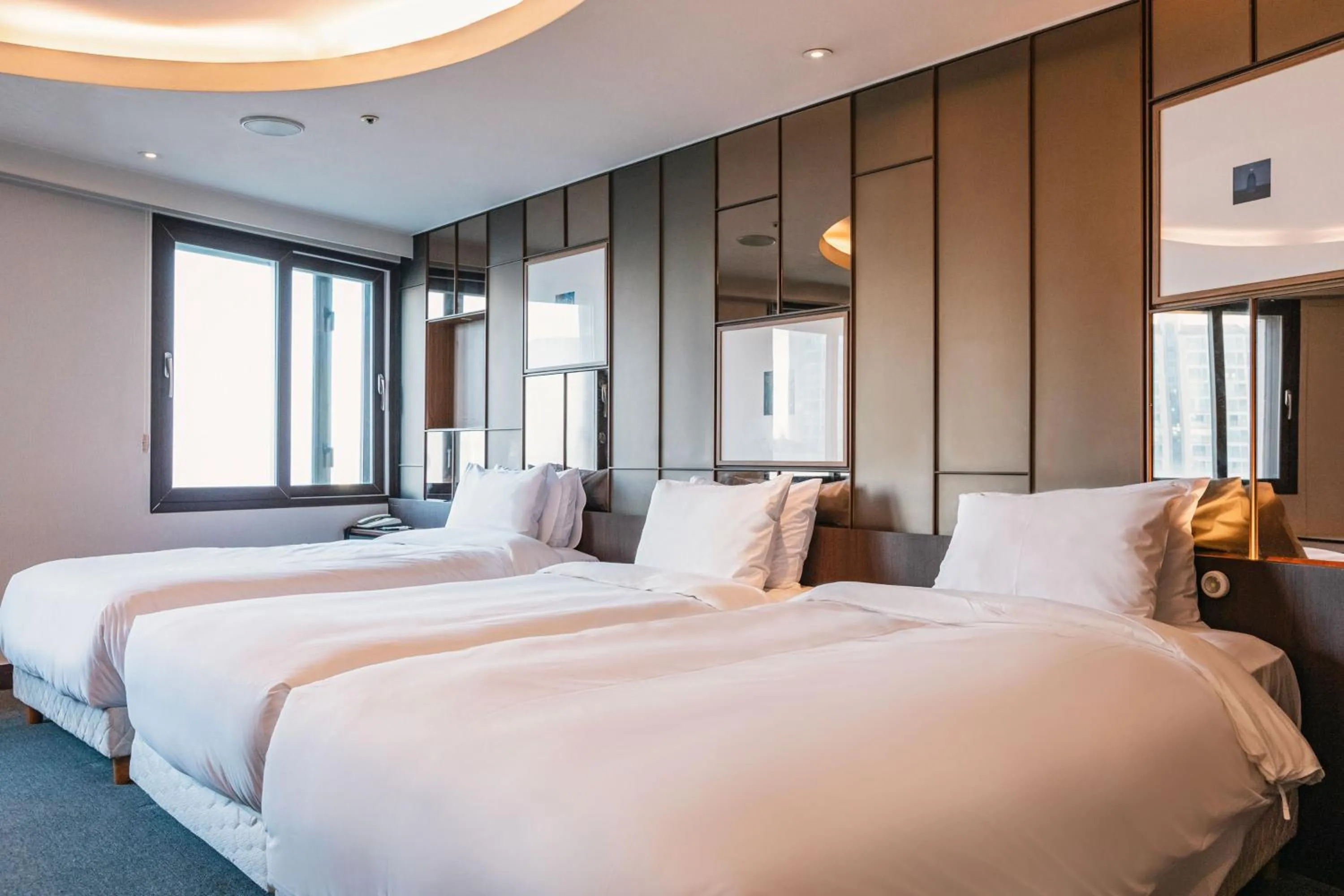 Bed in The Riverside Hotel