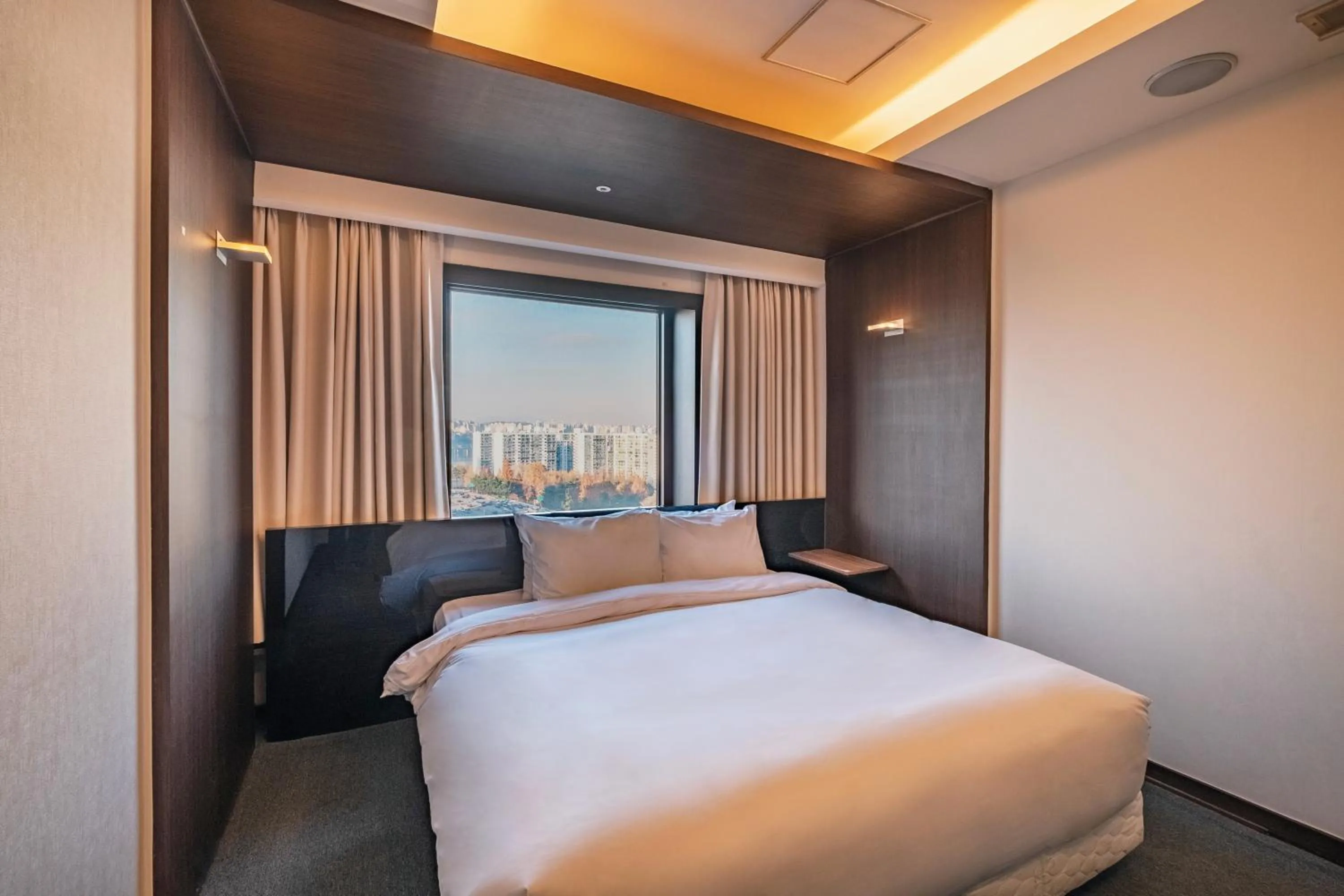 Bed in The Riverside Hotel