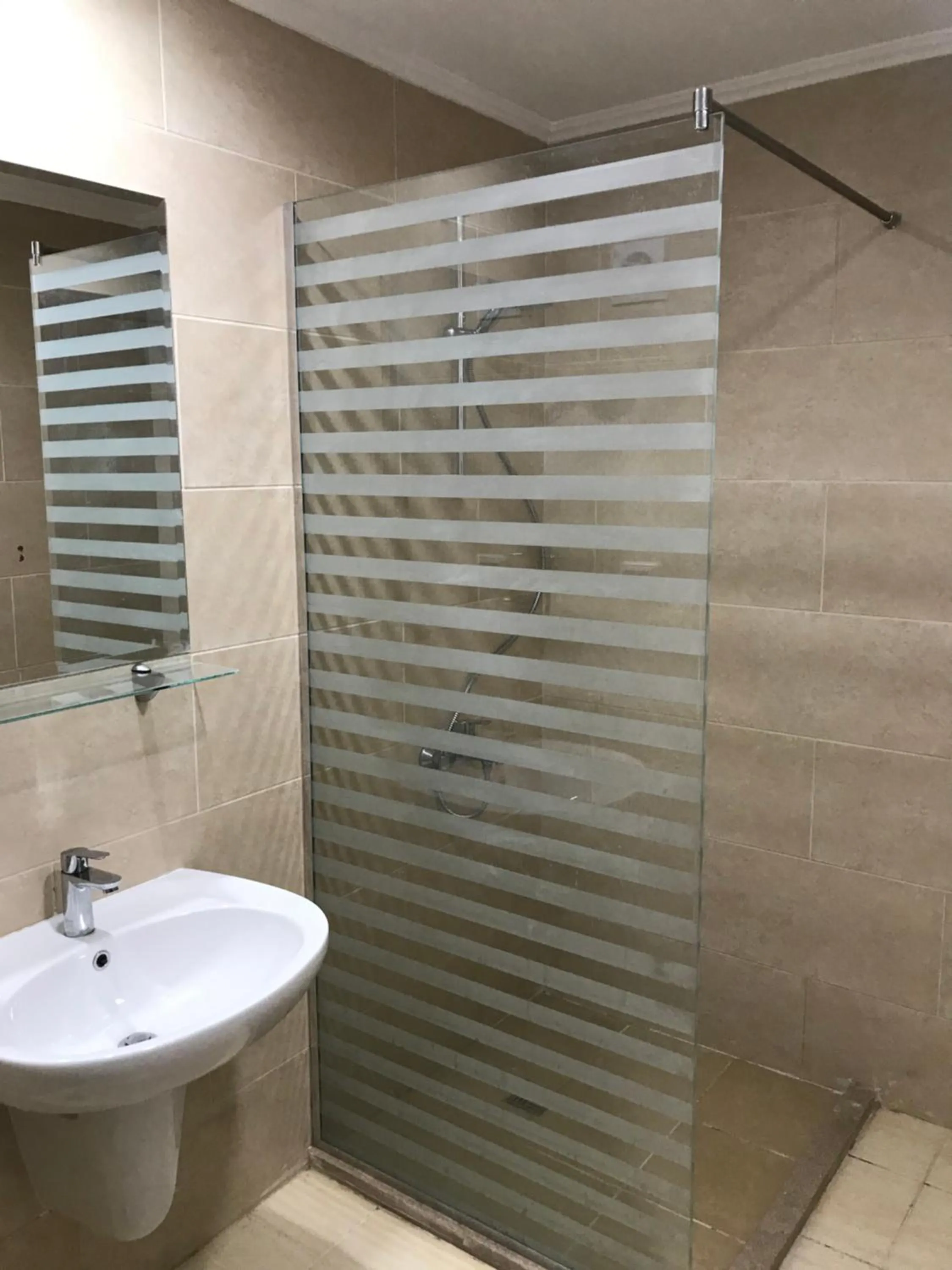 Shower in AlDau Heights Apartments