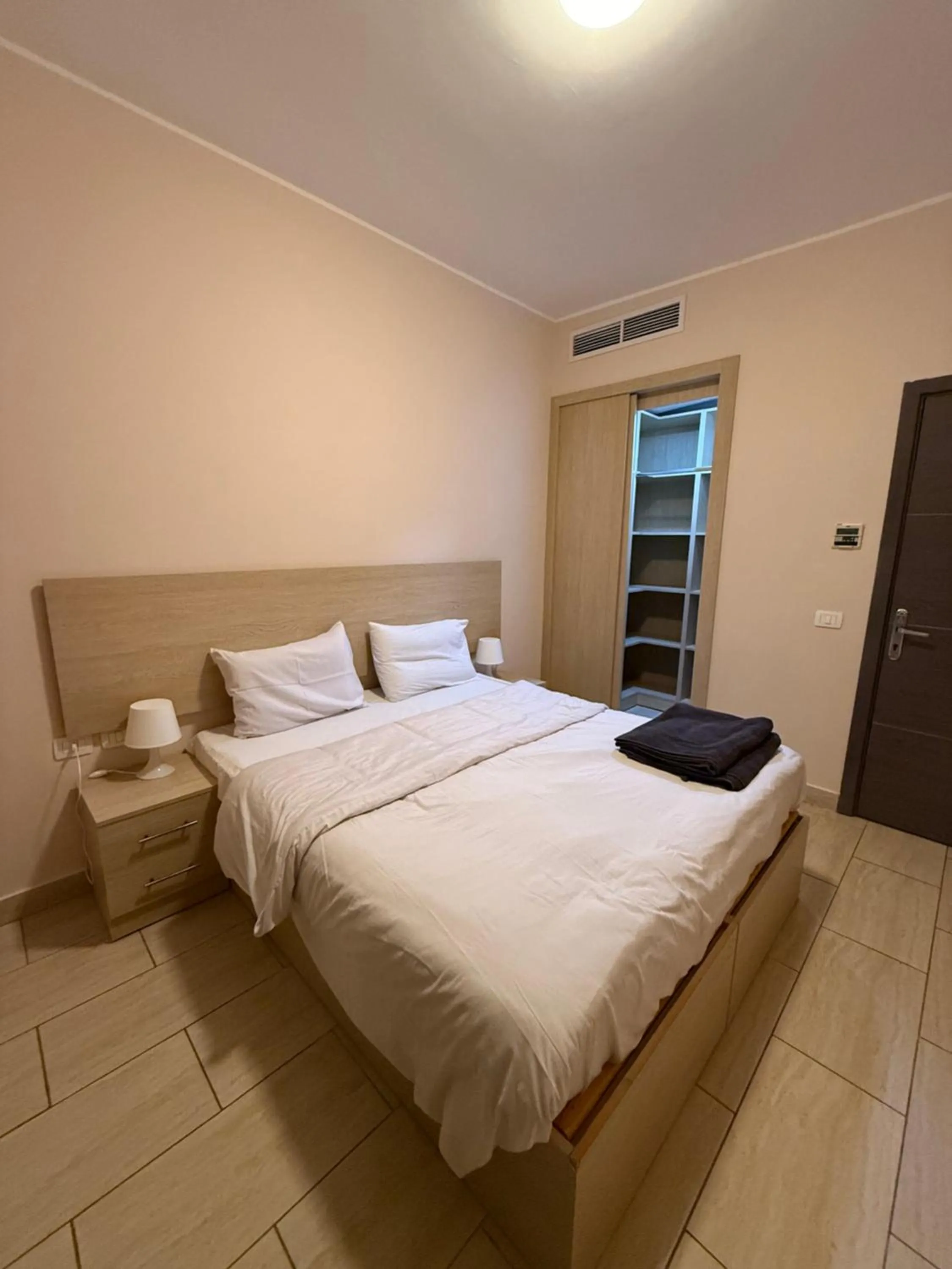 Bed in AlDau Heights Apartments