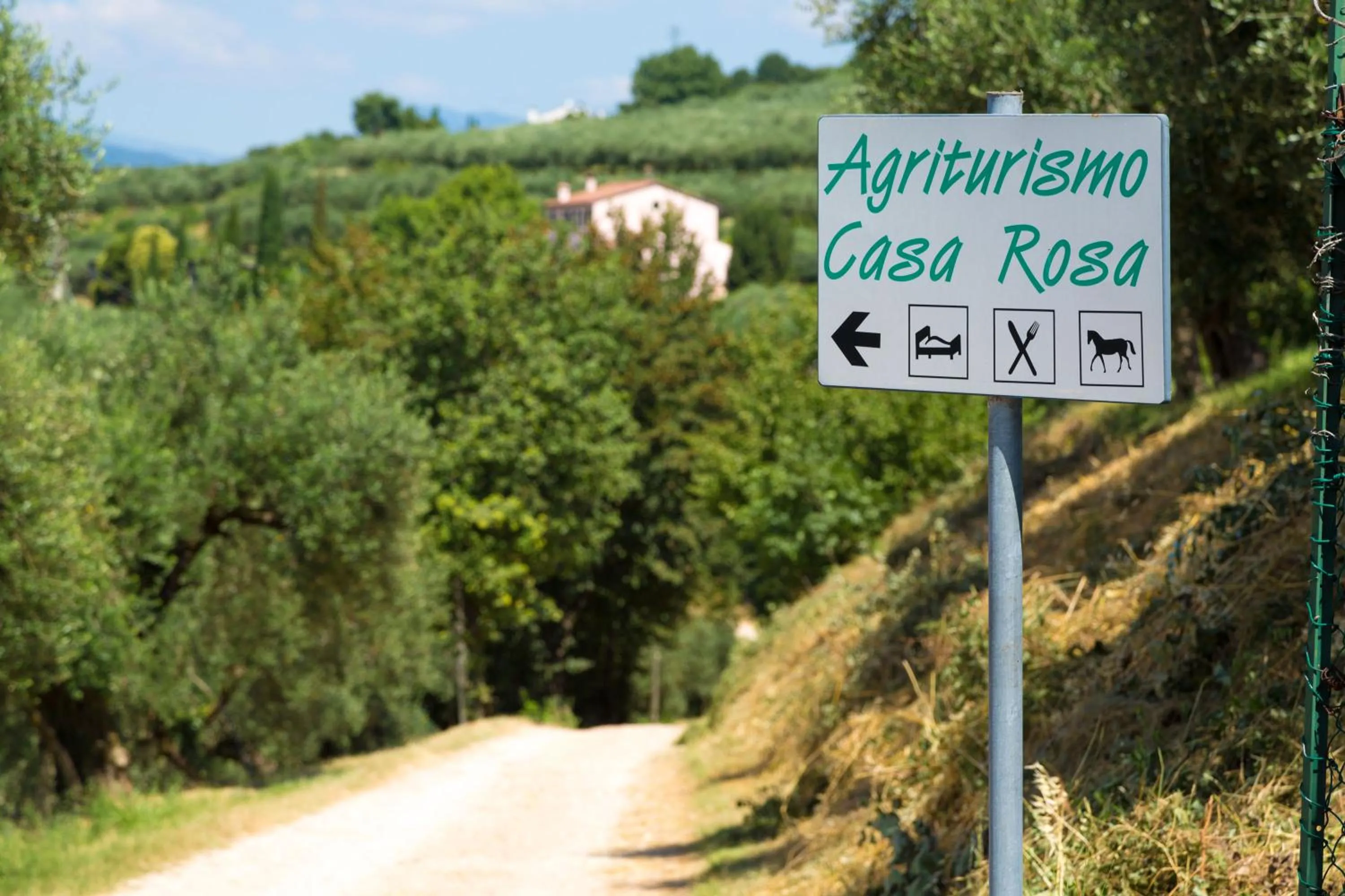 Property logo or sign in Agriturismo Casa Rosa