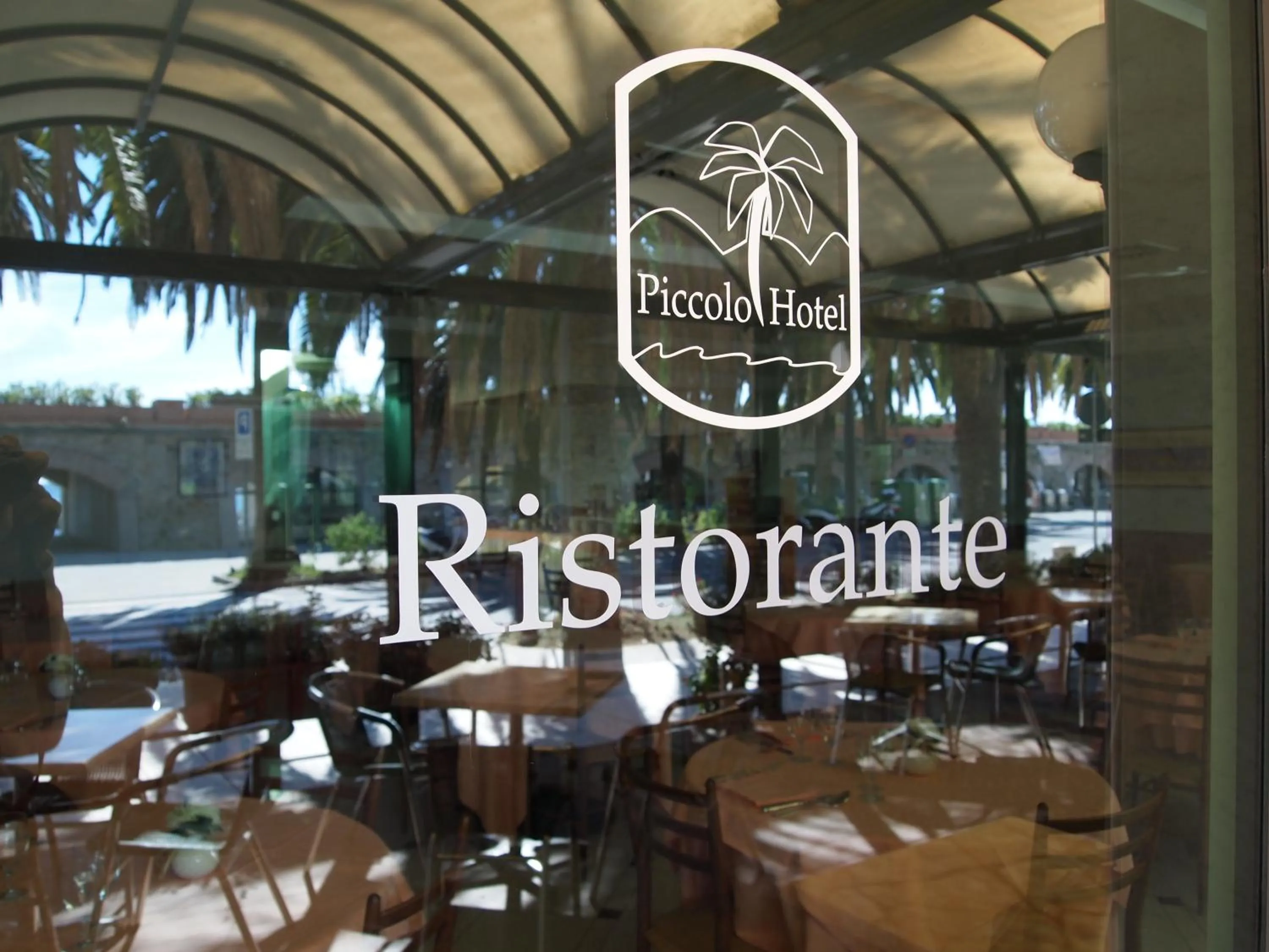 Property logo or sign in Piccolo Hotel