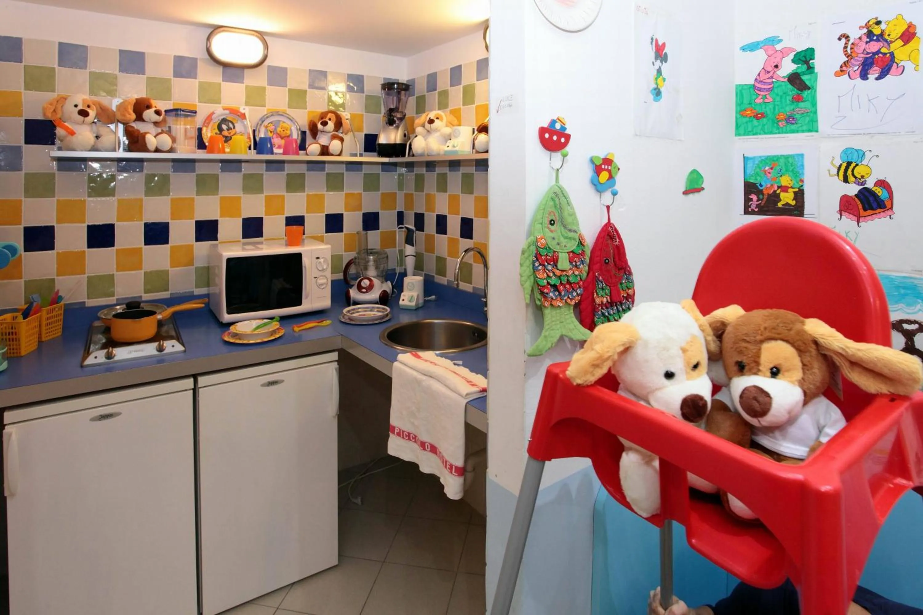 Kitchen or kitchenette in Piccolo Hotel