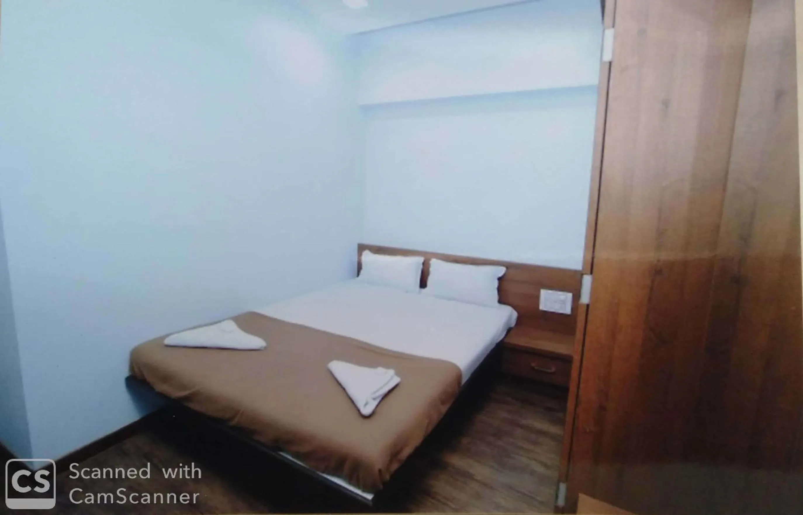 Bed in Rajhuns Deluxe Lodging