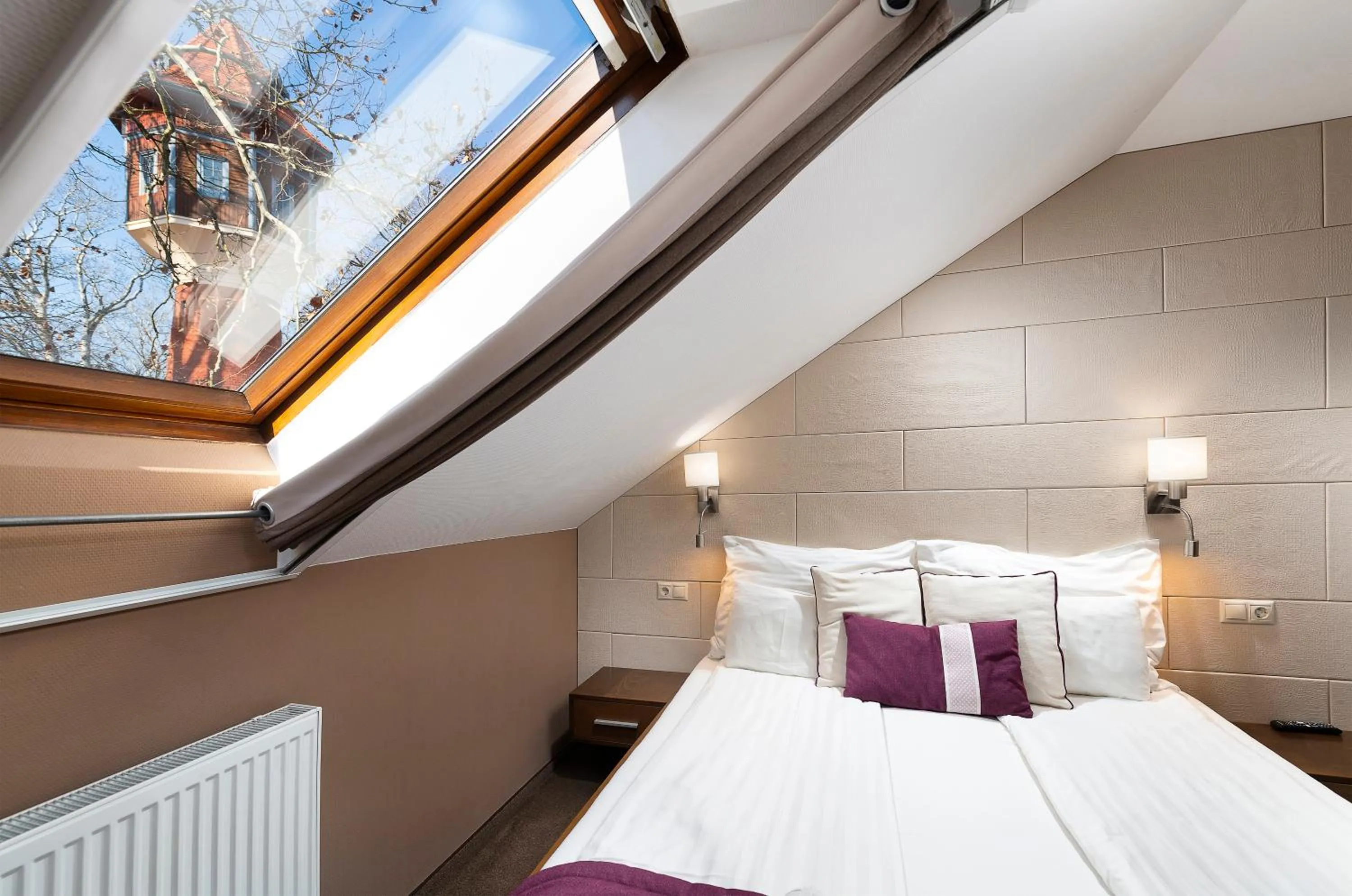 Bed in Hotel Fürdőház