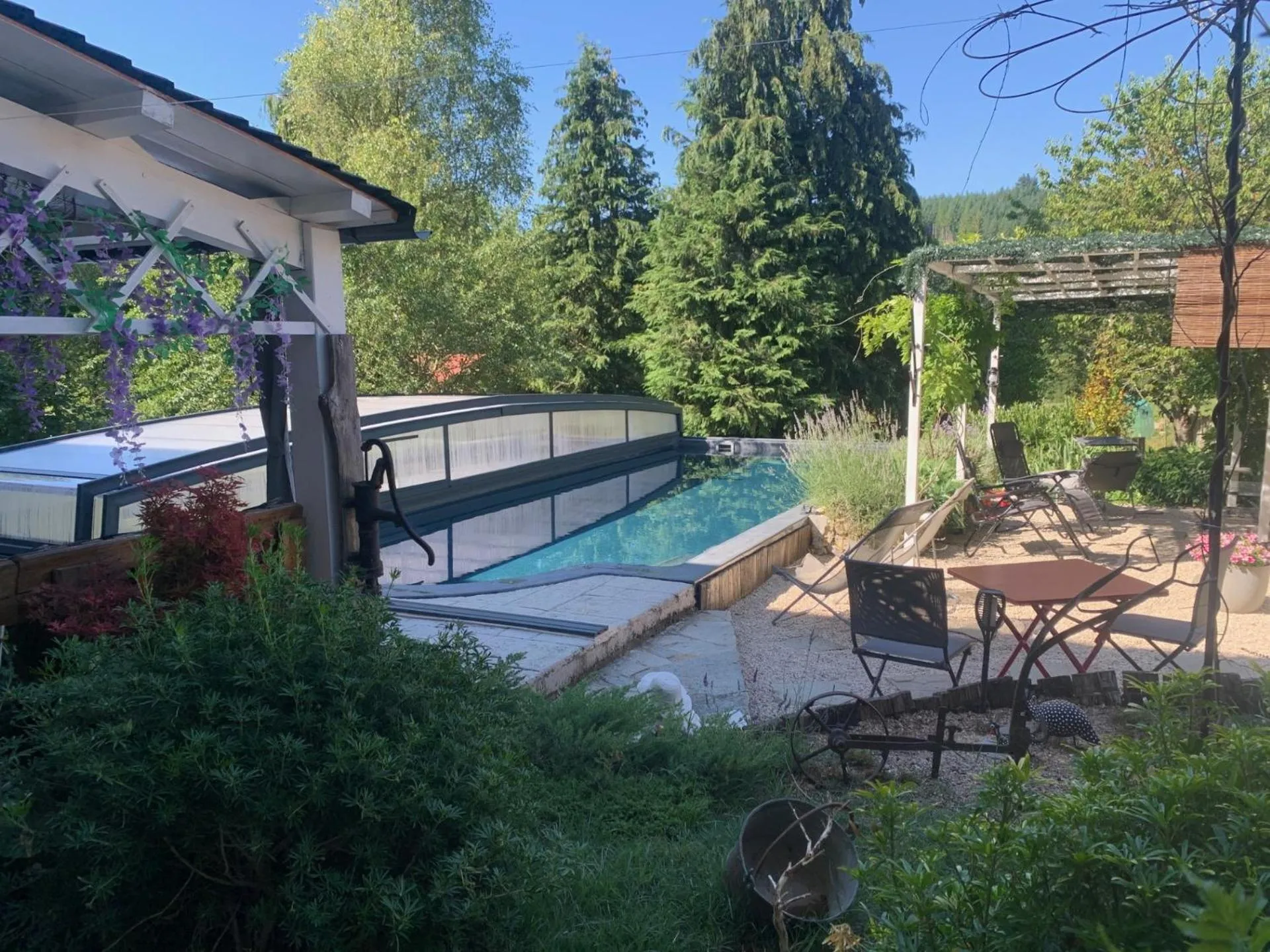 Swimming pool in Chambres d'Hôtes LES VERGERS DE LOUISE