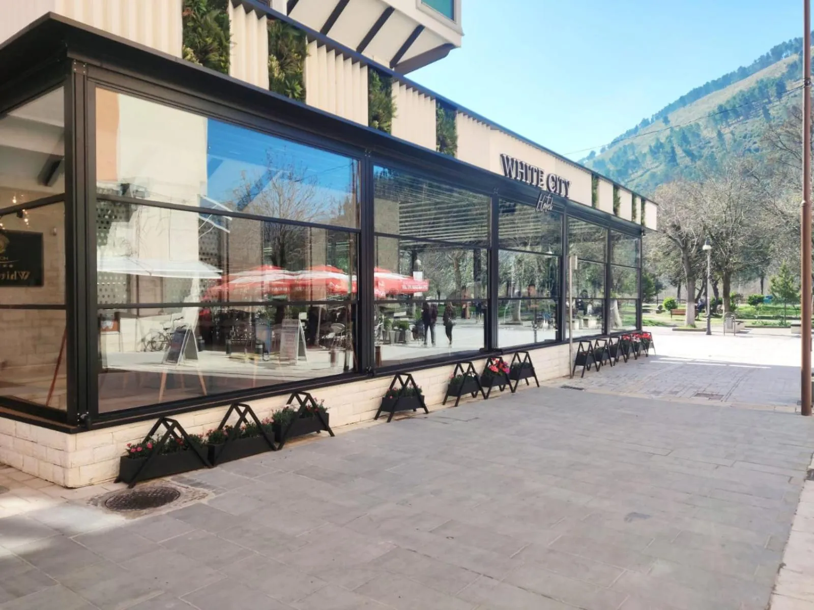 Property building in Hotel & Restaurant White City