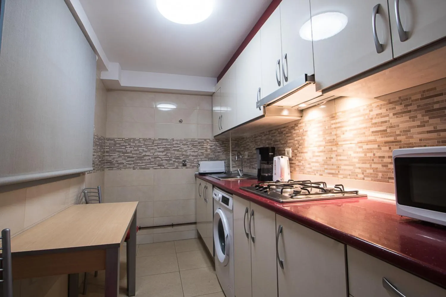 Kitchen or kitchenette in Apartamentos Torre Yago