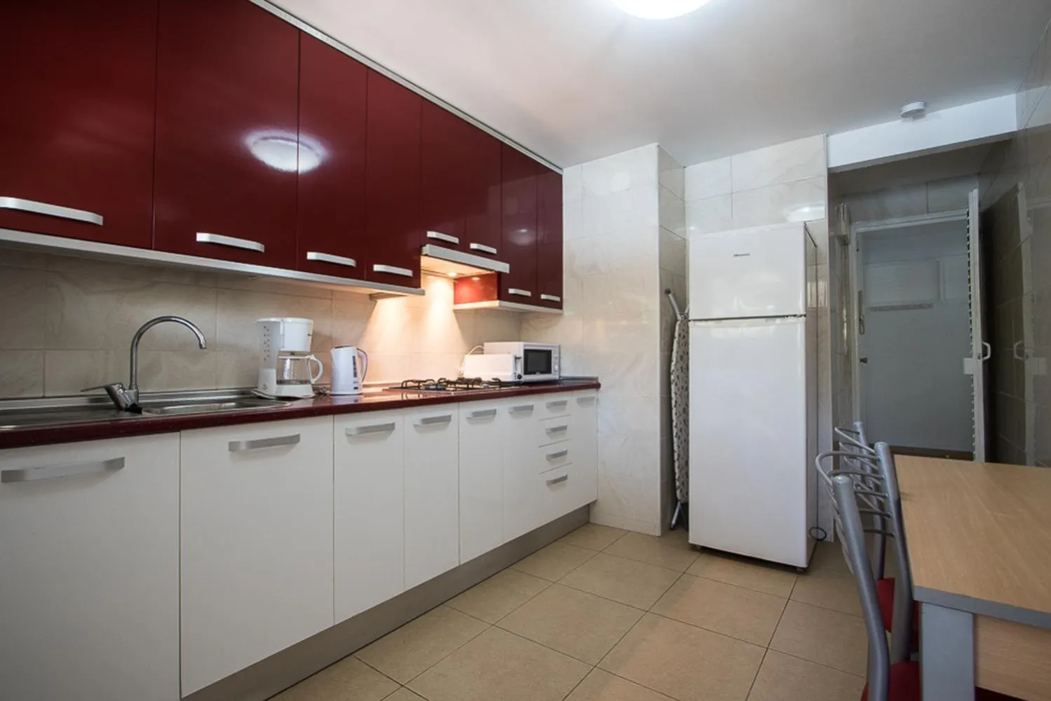 Kitchen or kitchenette in Apartamentos Torre Yago
