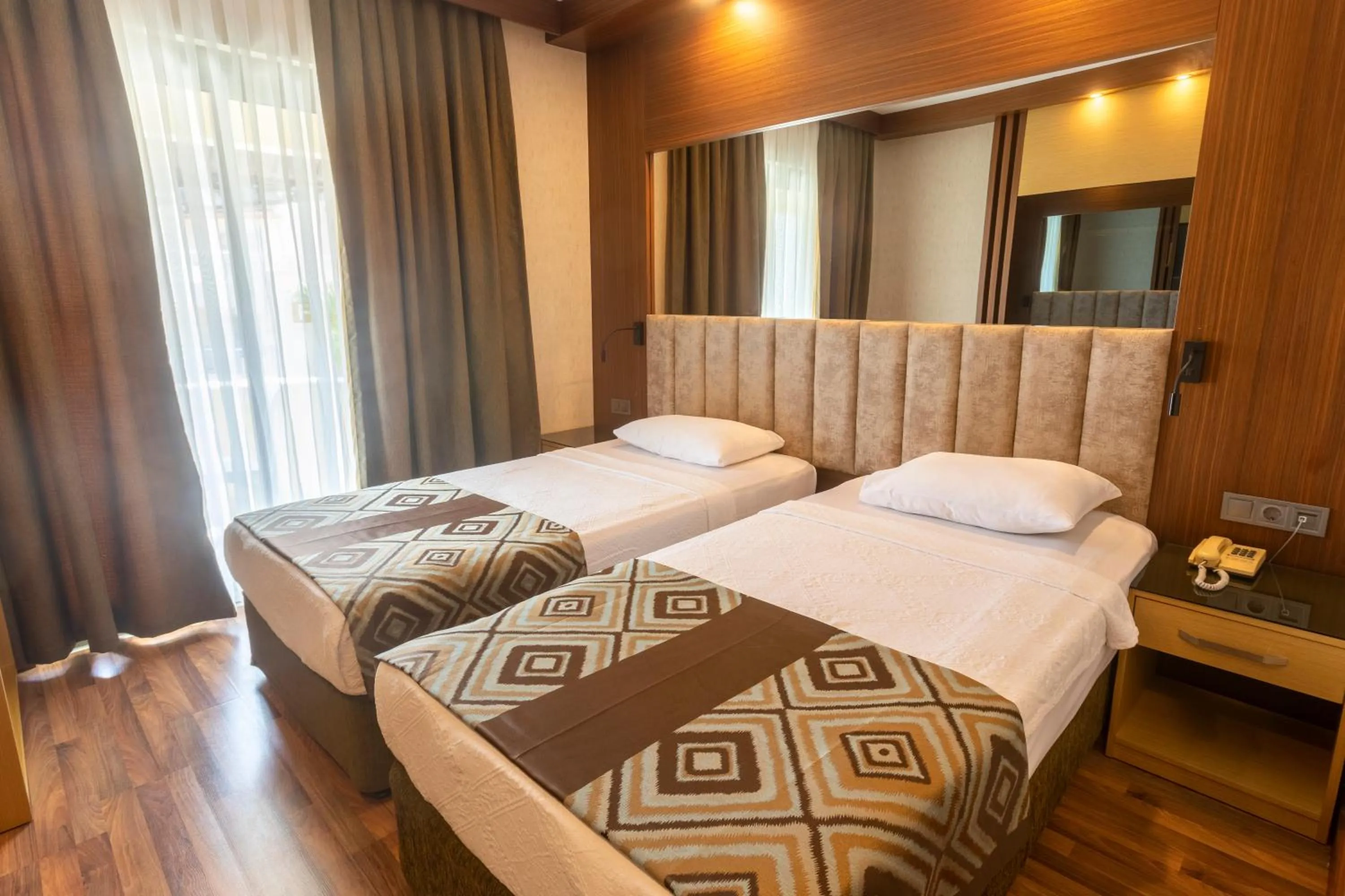 Bed in Fame Beach Hotel