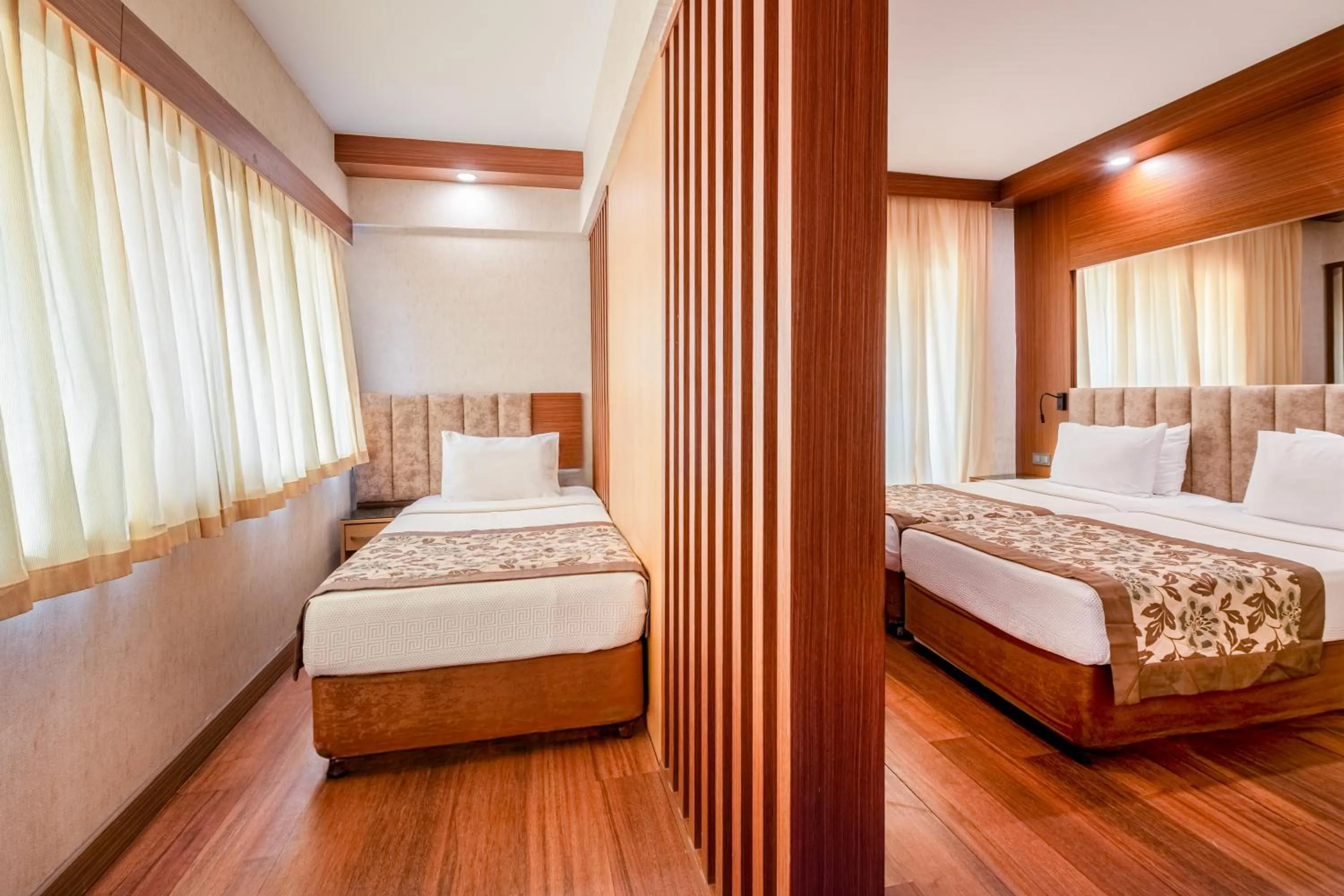 Bed in Fame Beach Hotel